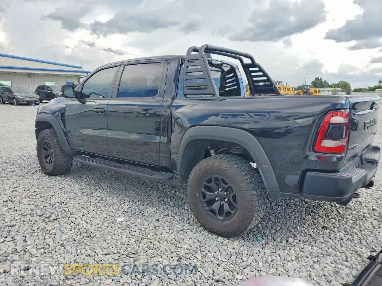 2 fotografías del automóvil dañado 1C6SRFU96MN901626 RAM 1500 2021