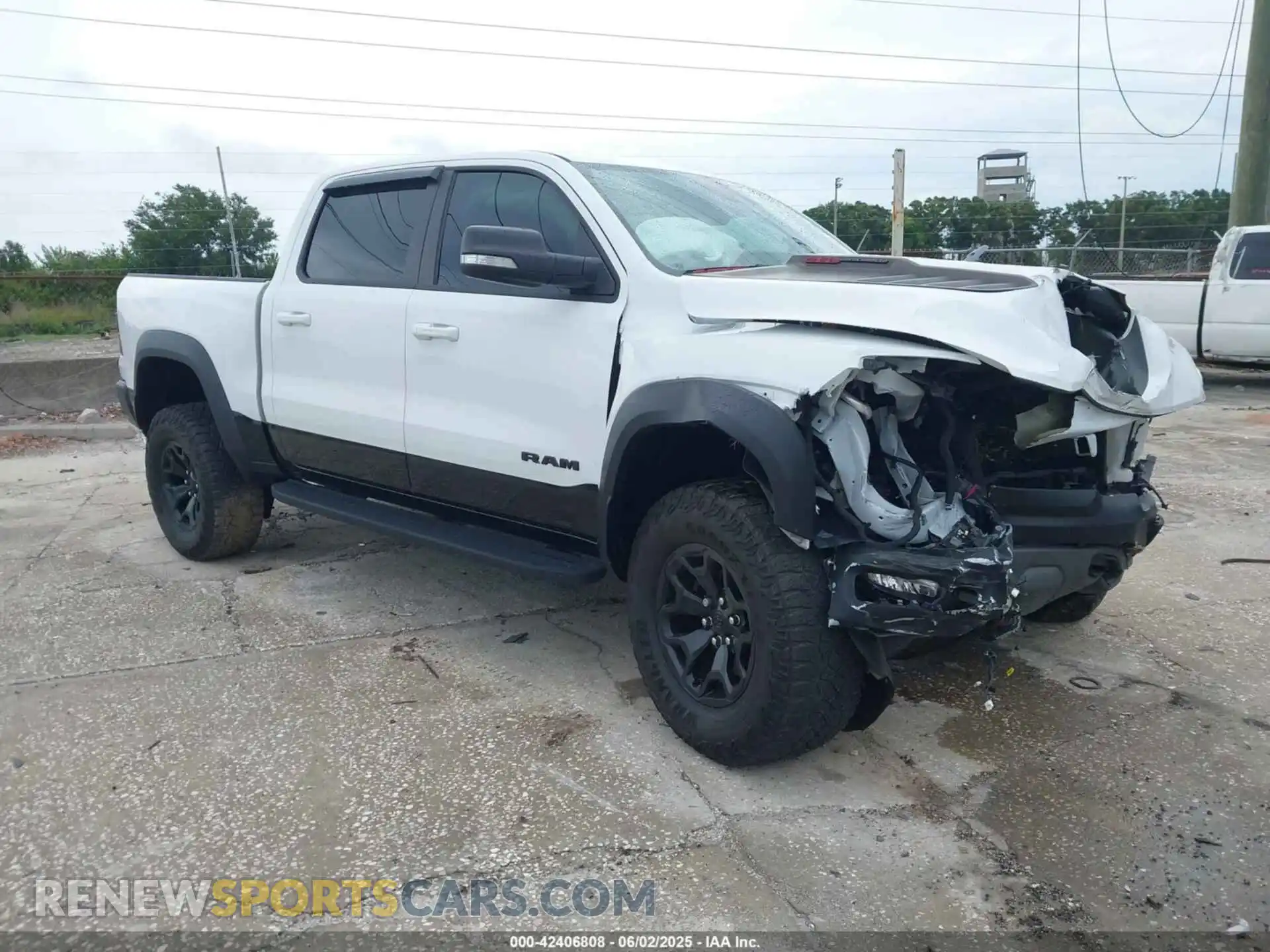 1 Photograph of a damaged car 1C6SRFU97MN719899 RAM 1500 2021