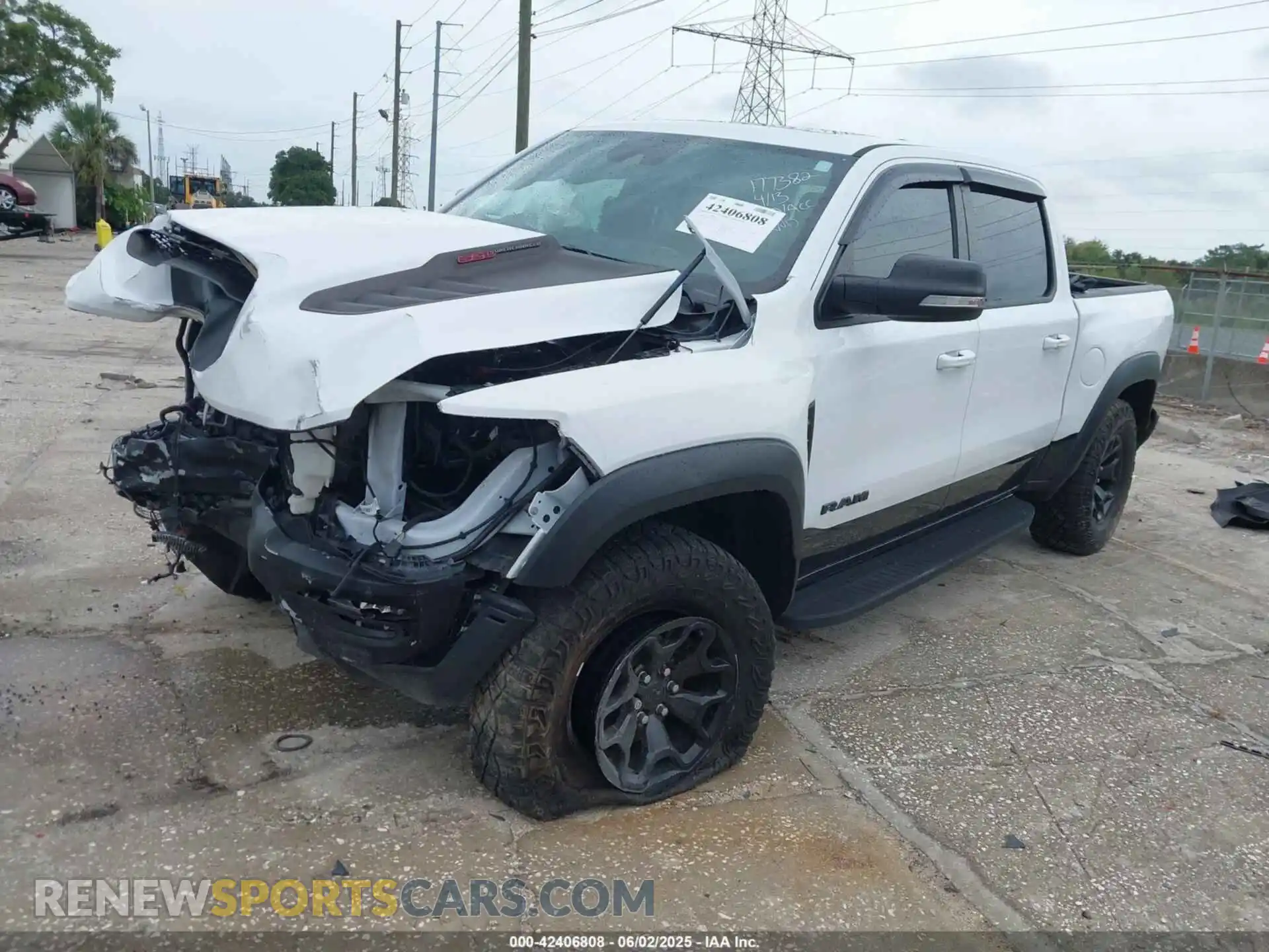 2 Photograph of a damaged car 1C6SRFU97MN719899 RAM 1500 2021