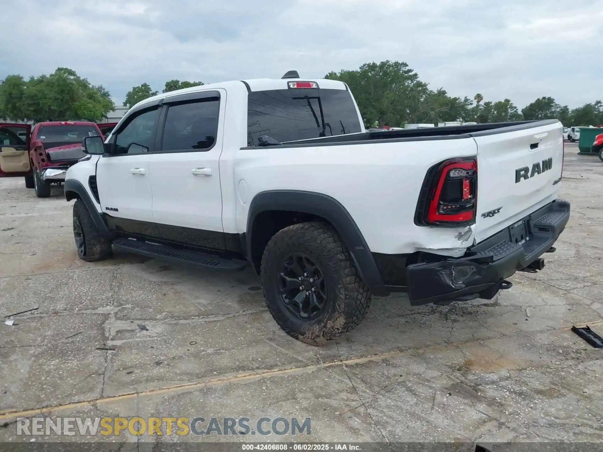3 Photograph of a damaged car 1C6SRFU97MN719899 RAM 1500 2021