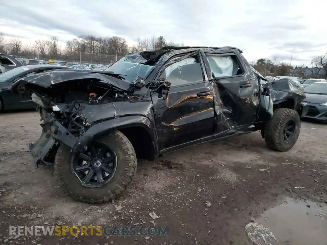 1 Photograph of a damaged car 1C6SRFU97MN826953 RAM 1500 2021