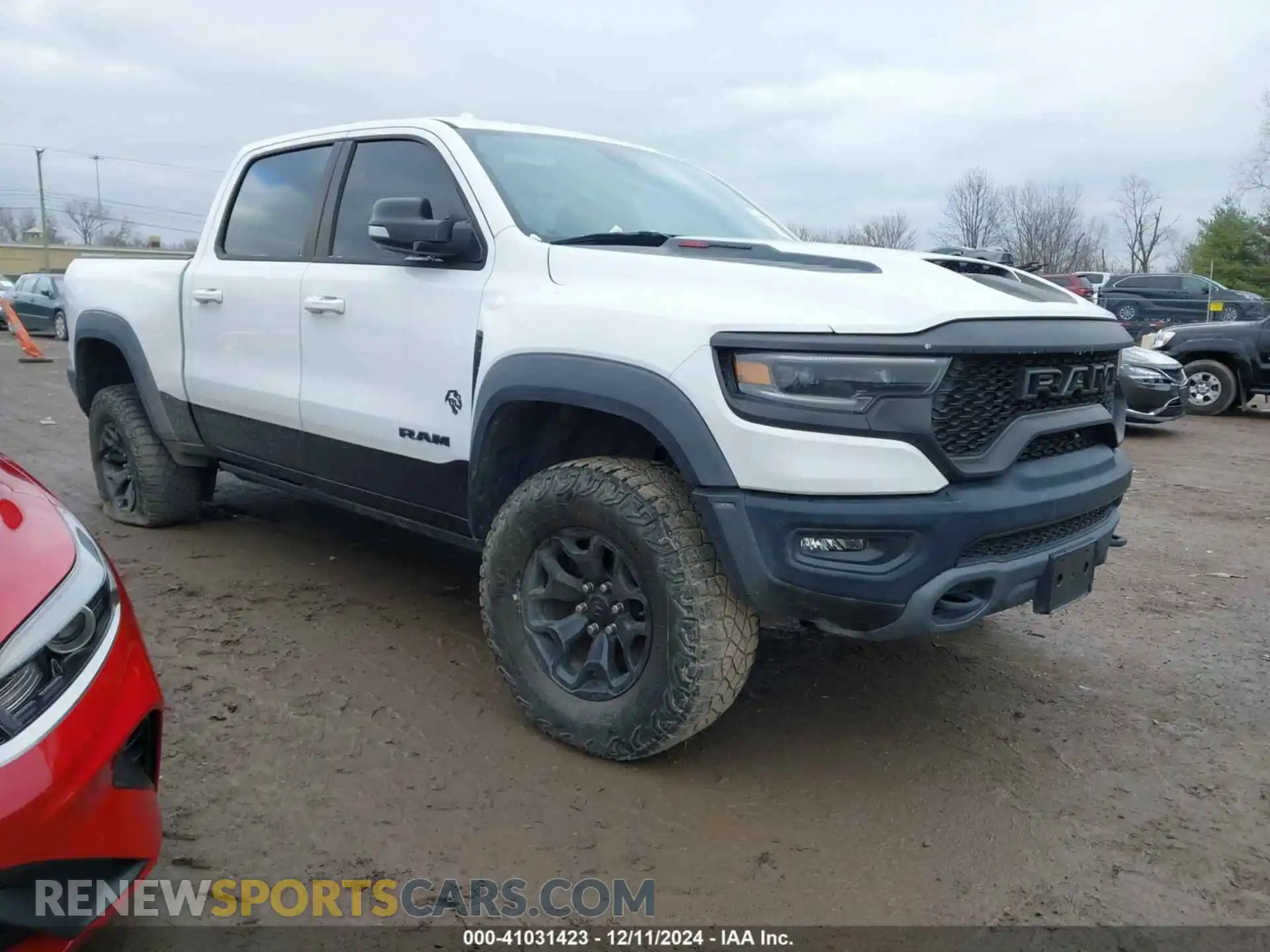 1 Photograph of a damaged car 1C6SRFU97MN905720 RAM 1500 2021