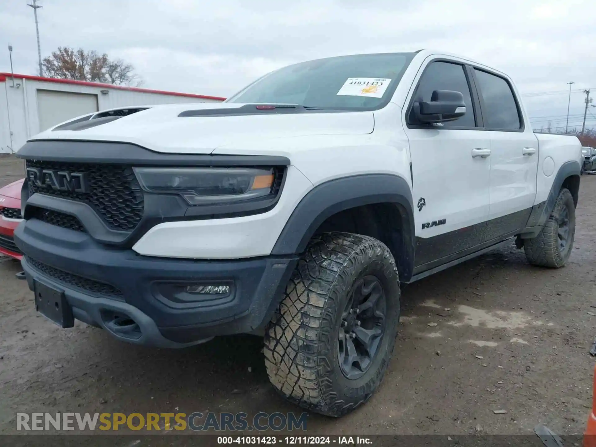 2 Photograph of a damaged car 1C6SRFU97MN905720 RAM 1500 2021