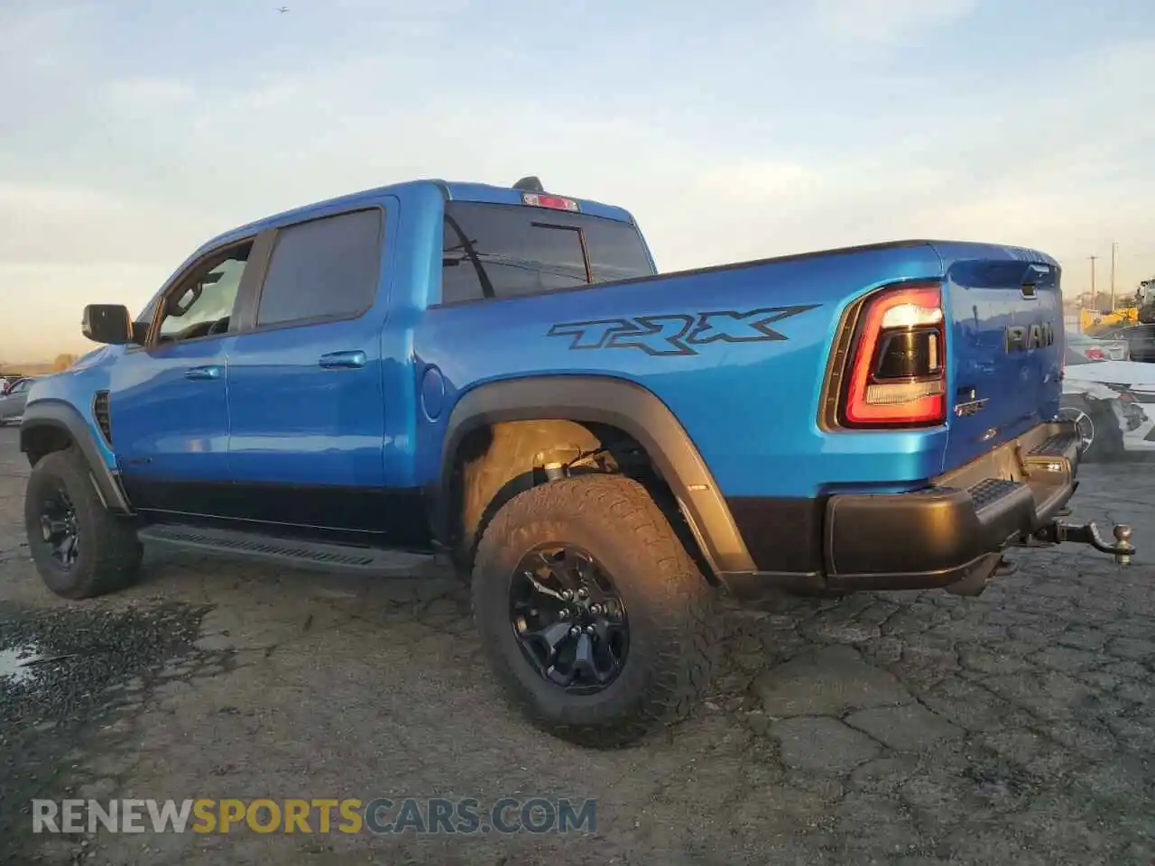 2 Photograph of a damaged car 1C6SRFU98MN757772 RAM 1500 2021