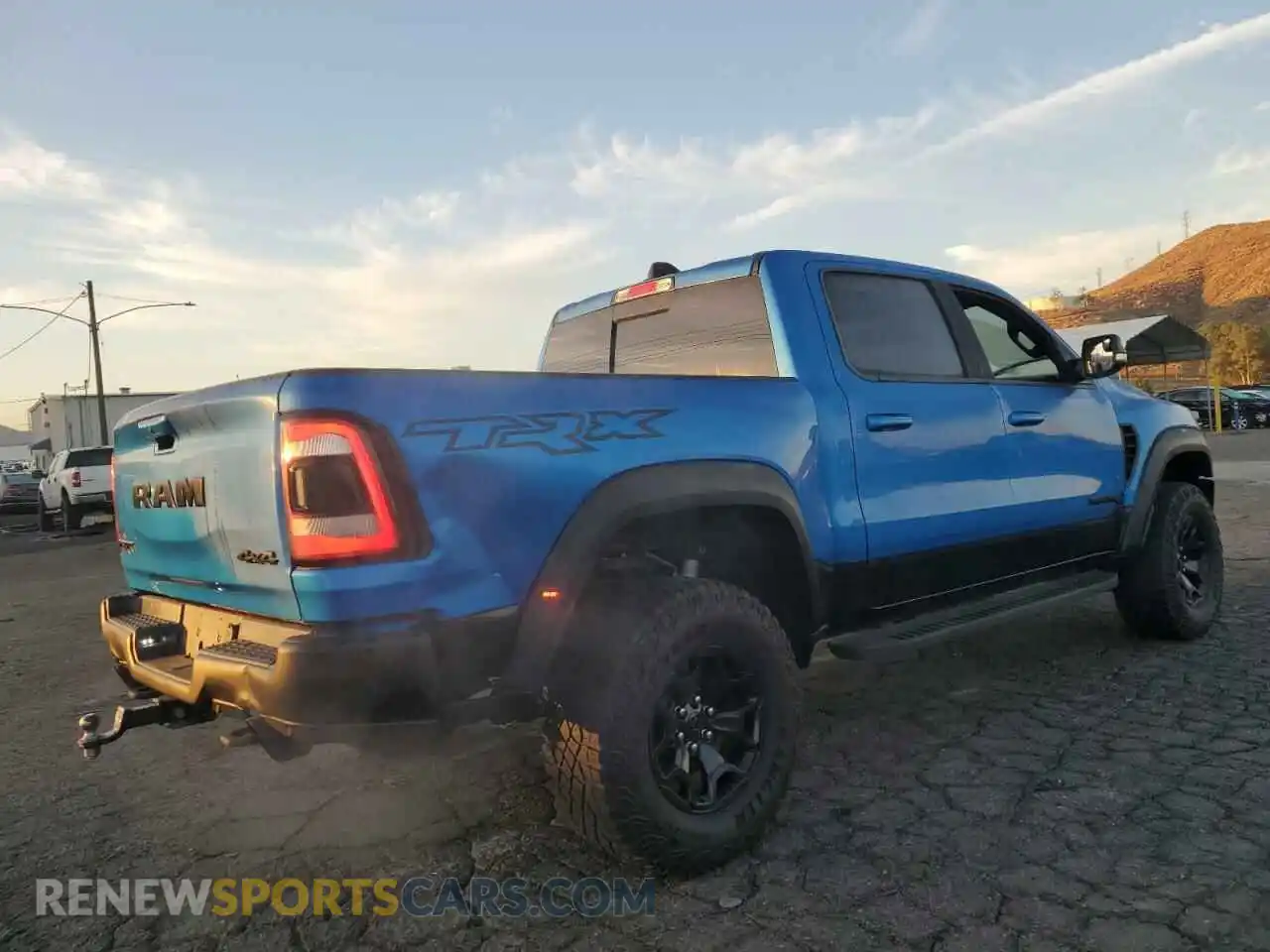 3 Photograph of a damaged car 1C6SRFU98MN757772 RAM 1500 2021