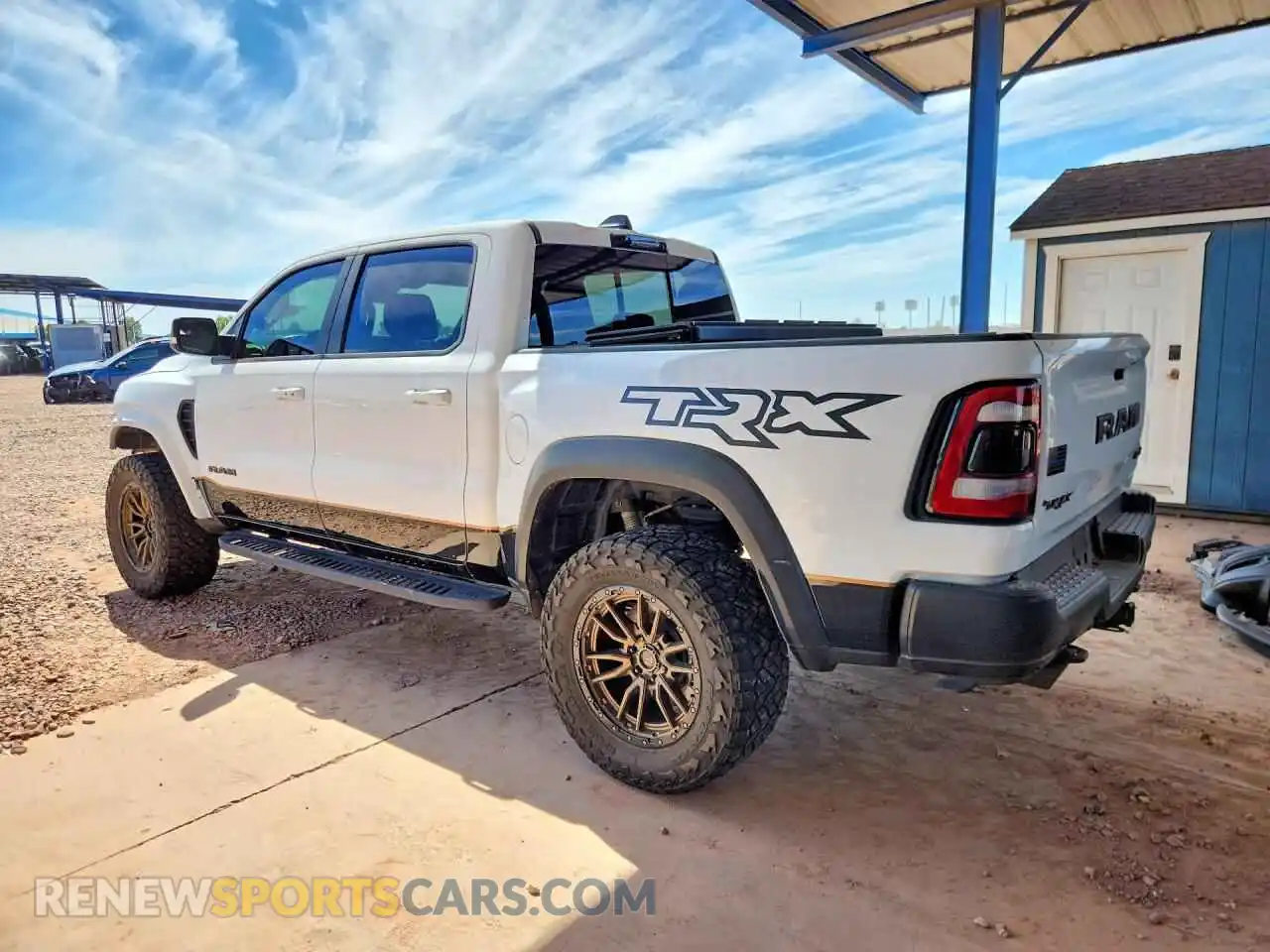 2 Photograph of a damaged car 1C6SRFU98MN818327 RAM 1500 2021