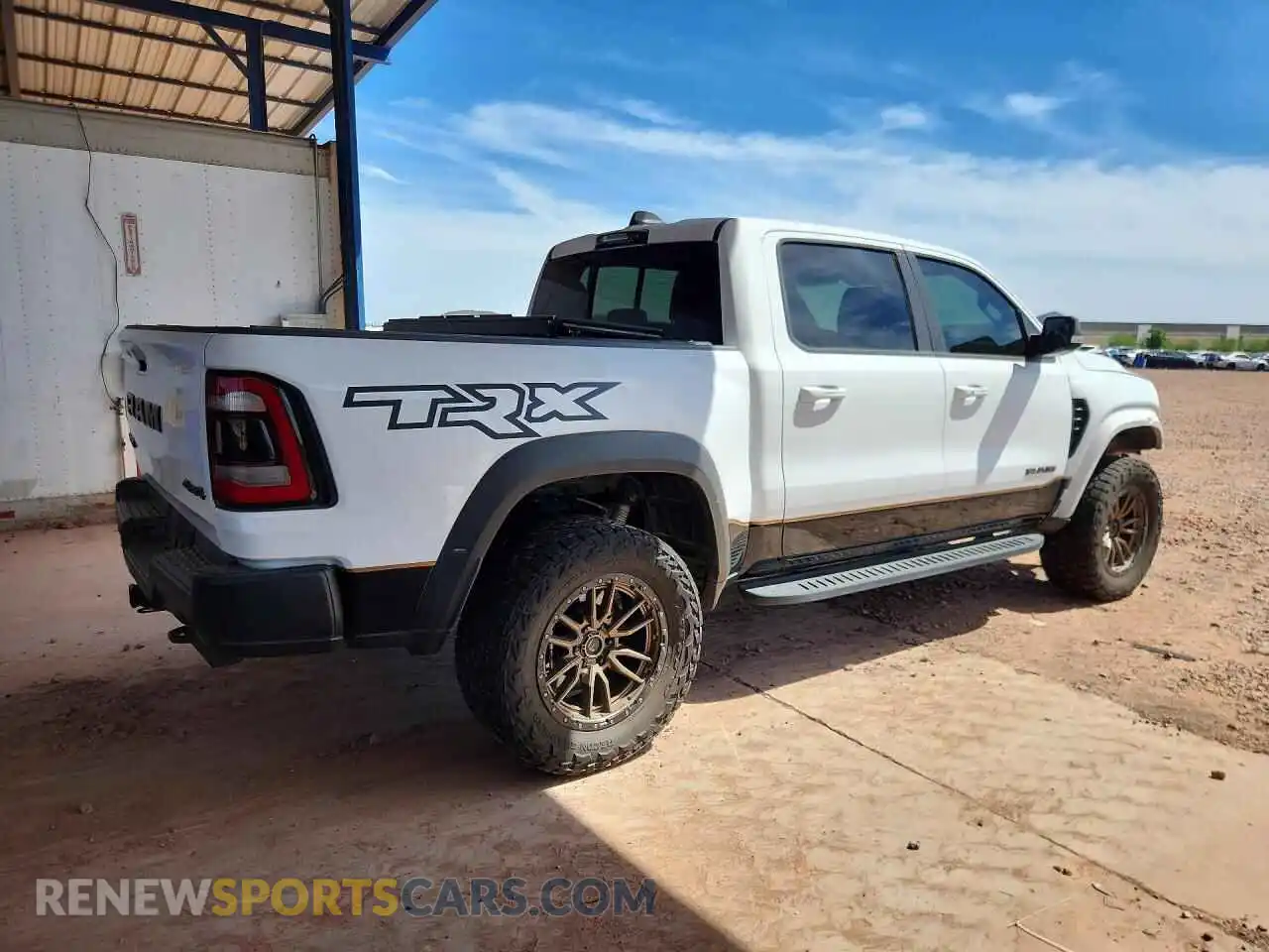 3 Photograph of a damaged car 1C6SRFU98MN818327 RAM 1500 2021