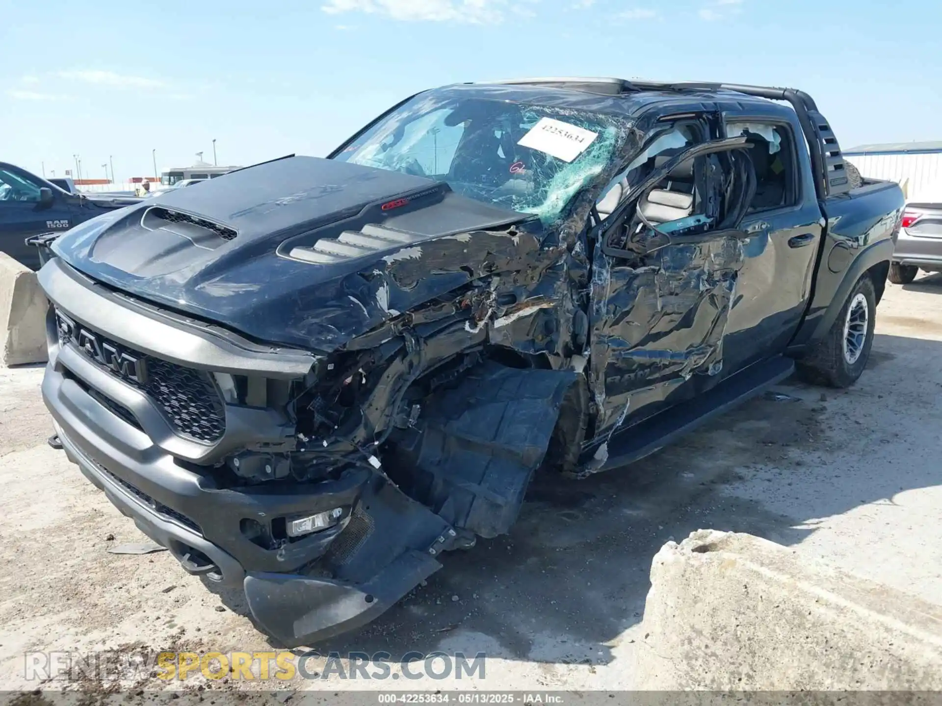 2 Photograph of a damaged car 1C6SRFU98MN902423 RAM 1500 2021