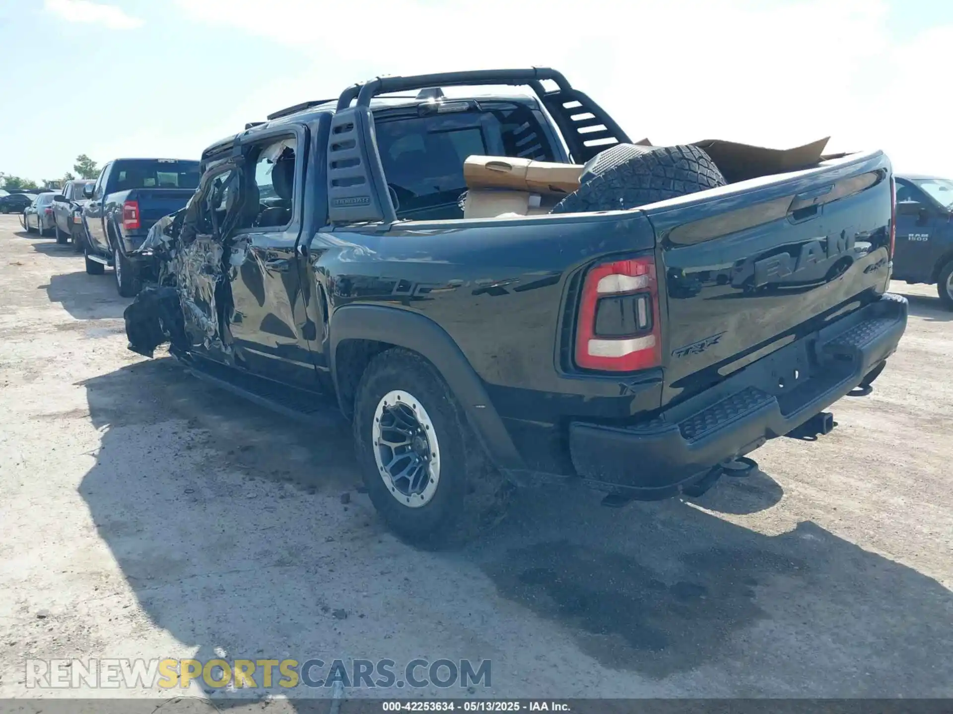 3 Photograph of a damaged car 1C6SRFU98MN902423 RAM 1500 2021