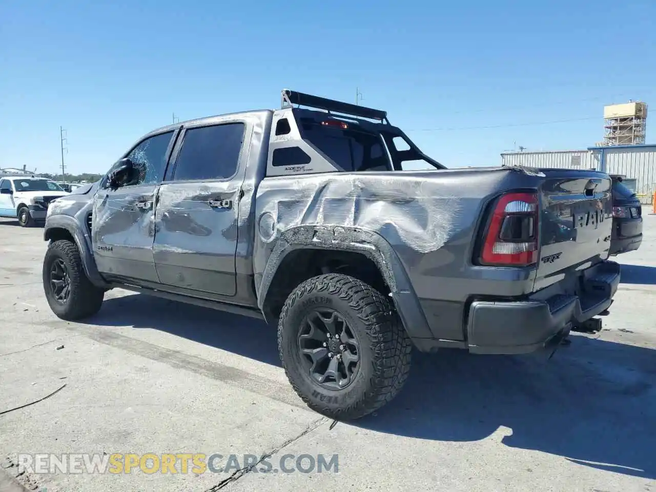 2 Photograph of a damaged car 1C6SRFU99MN744688 RAM 1500 2021