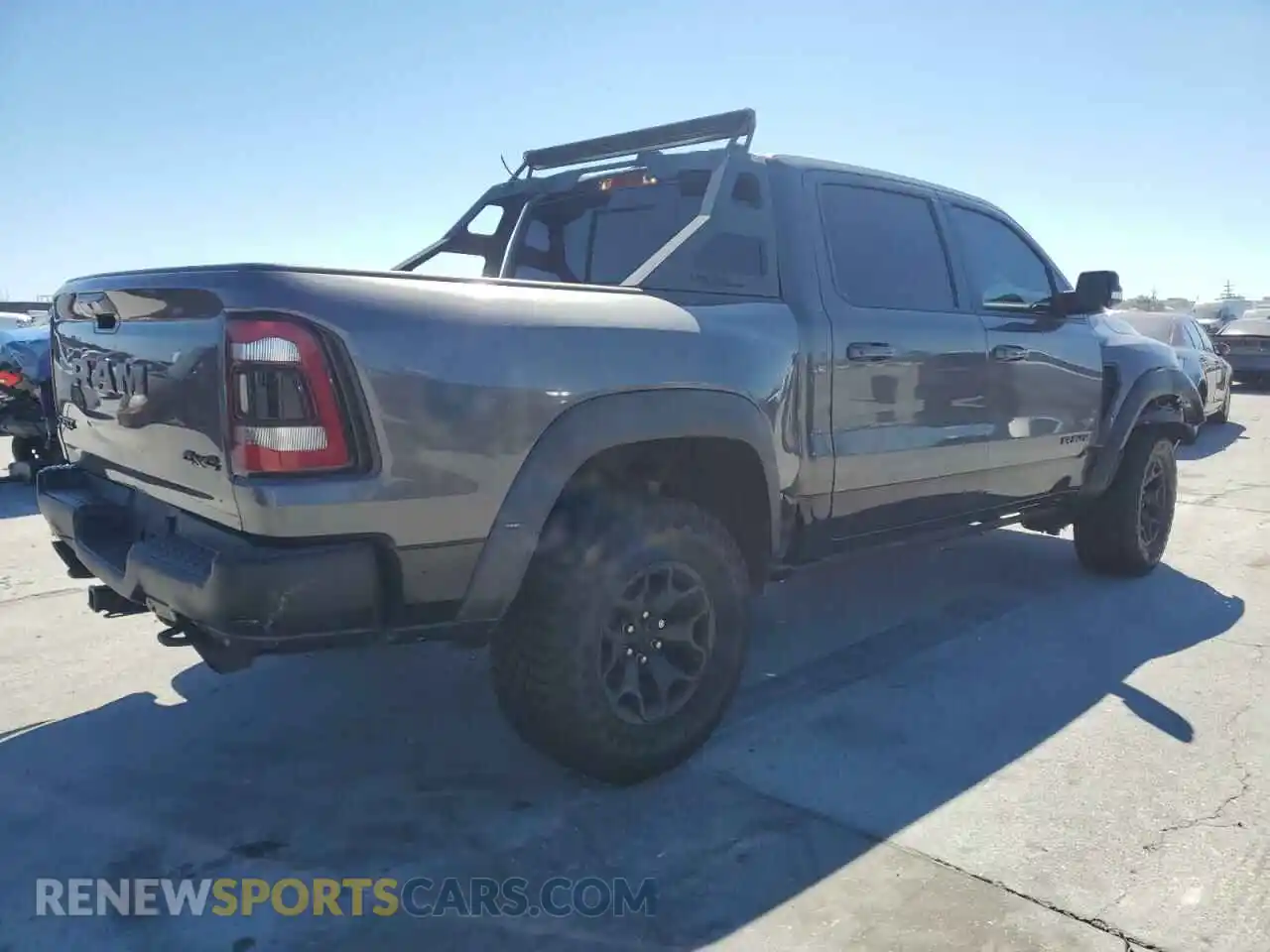 3 Photograph of a damaged car 1C6SRFU99MN744688 RAM 1500 2021