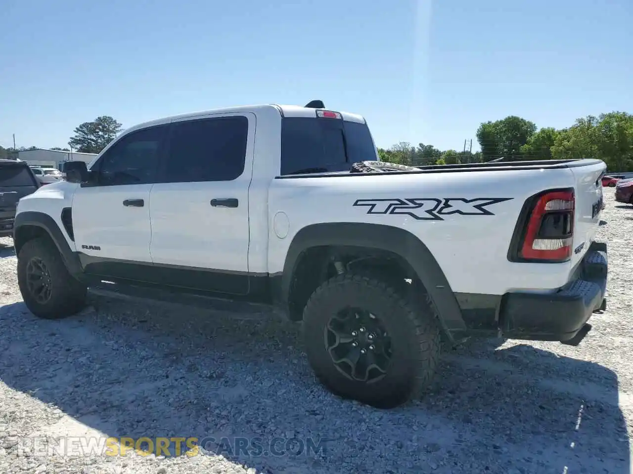 2 Photograph of a damaged car 1C6SRFU99MN756338 RAM 1500 2021