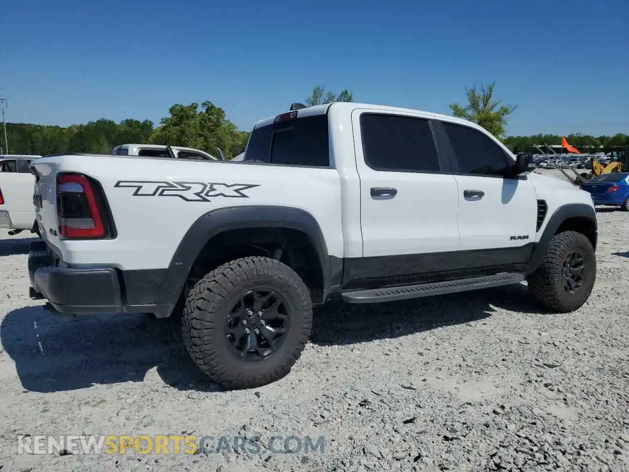 3 Photograph of a damaged car 1C6SRFU99MN756338 RAM 1500 2021