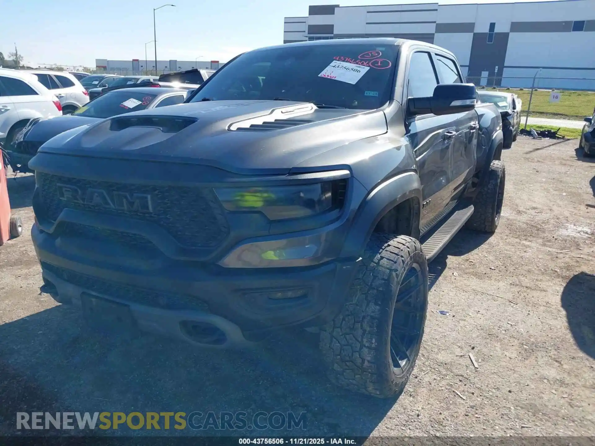 2 Photograph of a damaged car 1C6SRFU99MN814657 RAM 1500 2021