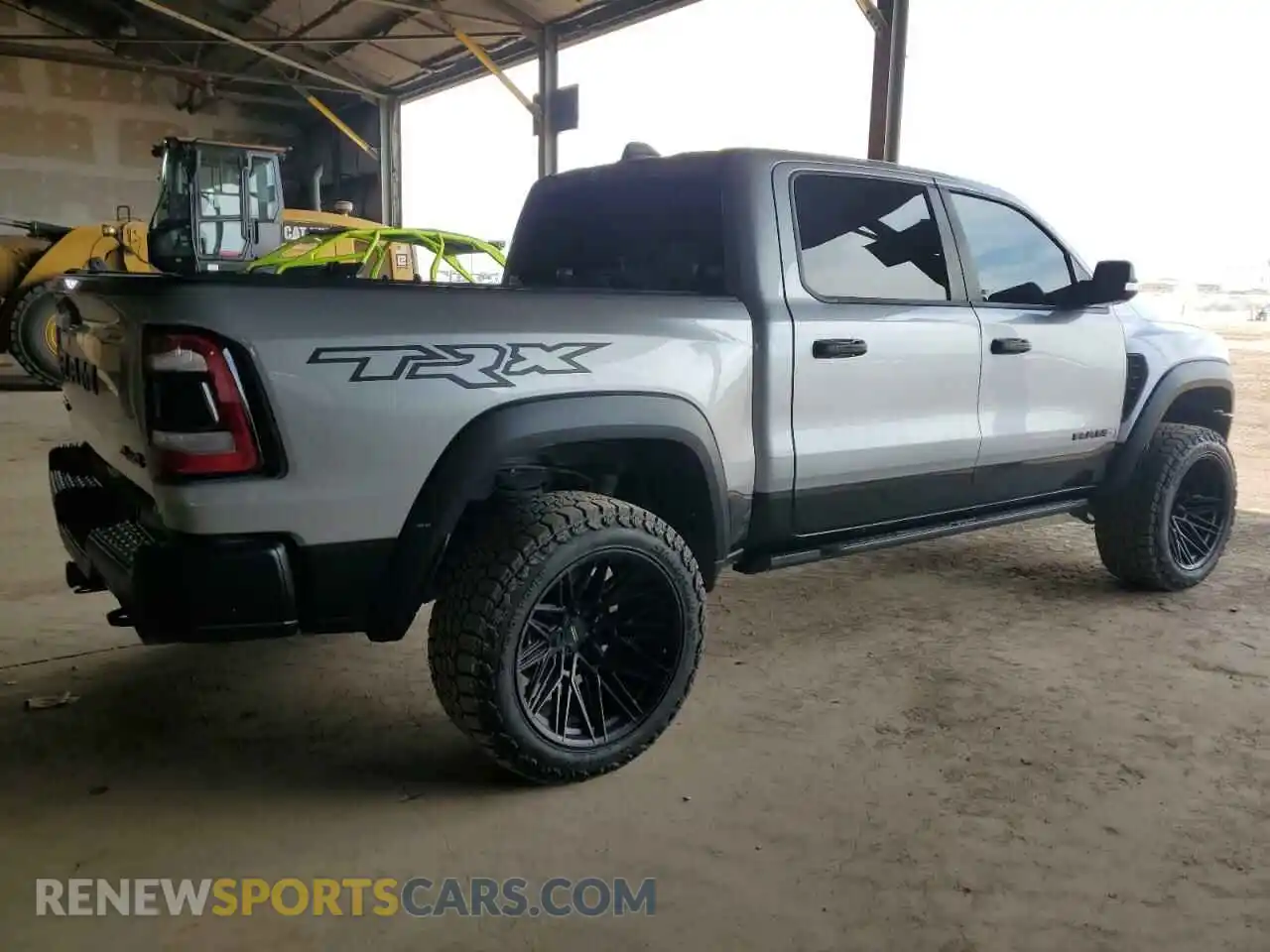 3 Photograph of a damaged car 1C6SRFU99MN905668 RAM 1500 2021