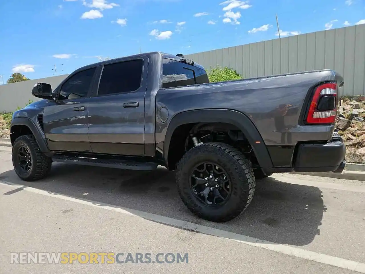 2 Photograph of a damaged car 1C6SRFU9XMN780096 RAM 1500 2021