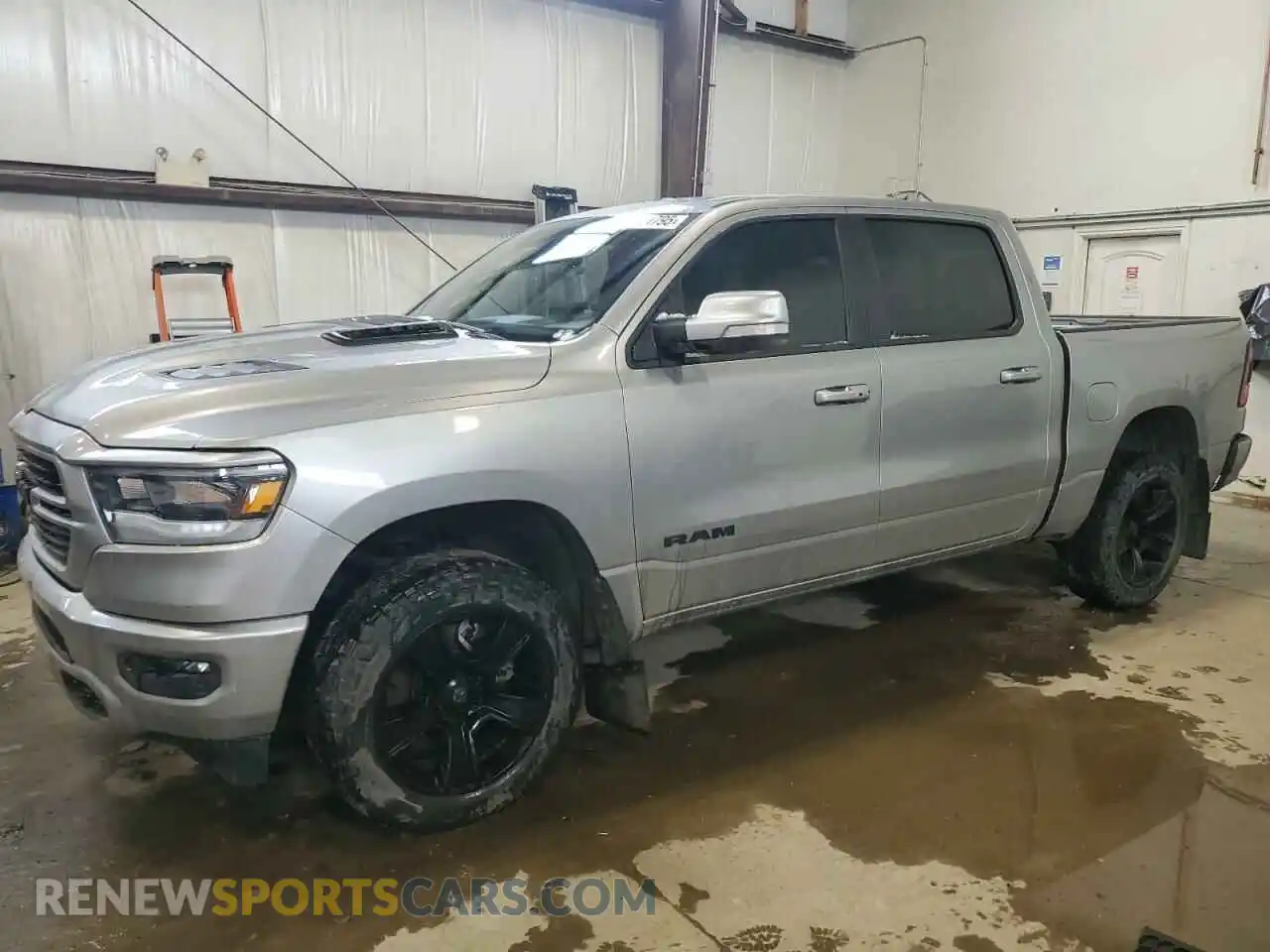 1 Photograph of a damaged car 1C6SRFVT1MN667096 RAM 1500 2021
