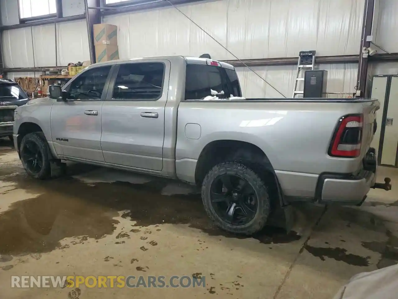 2 Photograph of a damaged car 1C6SRFVT1MN667096 RAM 1500 2021