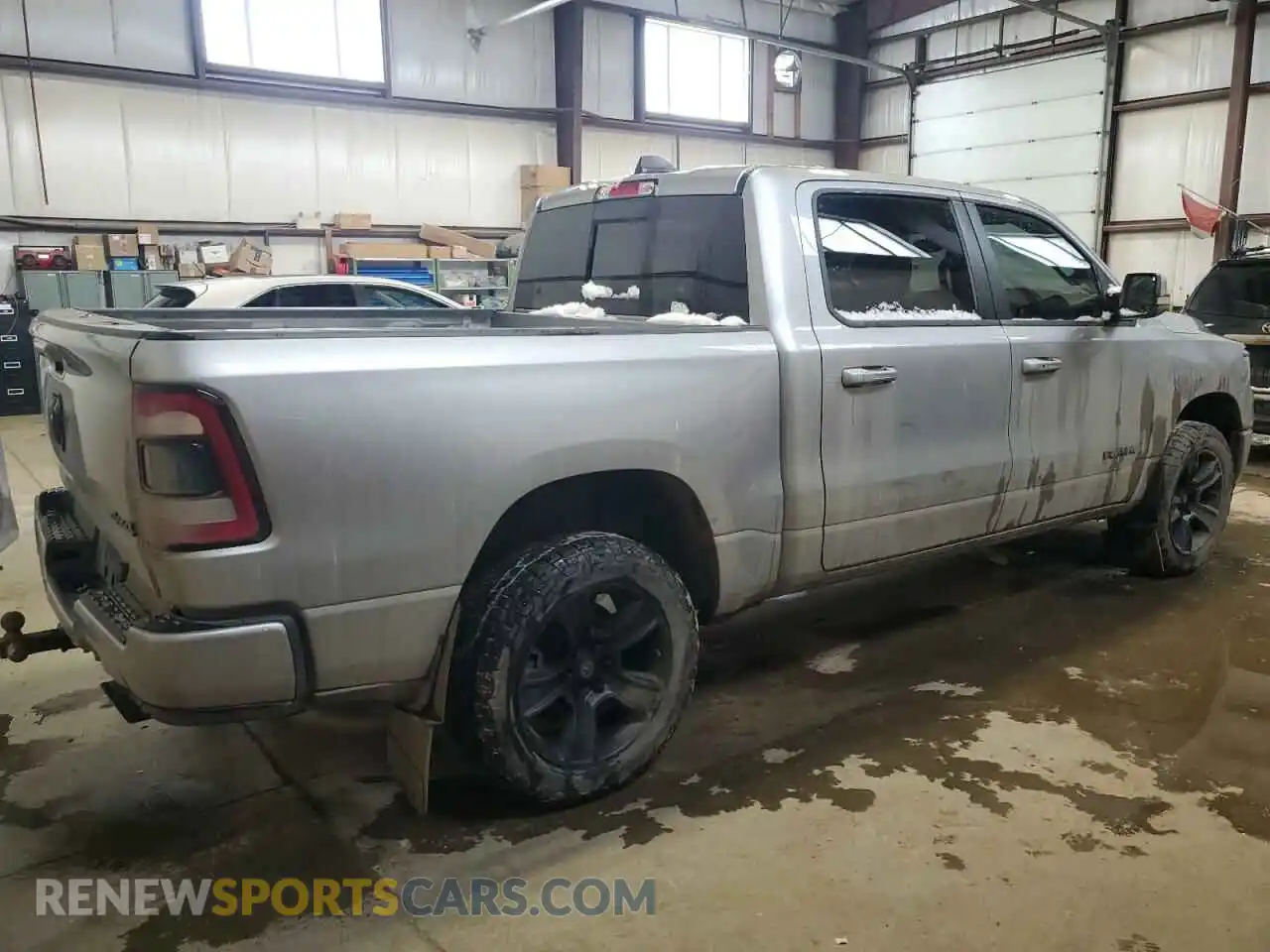 3 Photograph of a damaged car 1C6SRFVT1MN667096 RAM 1500 2021