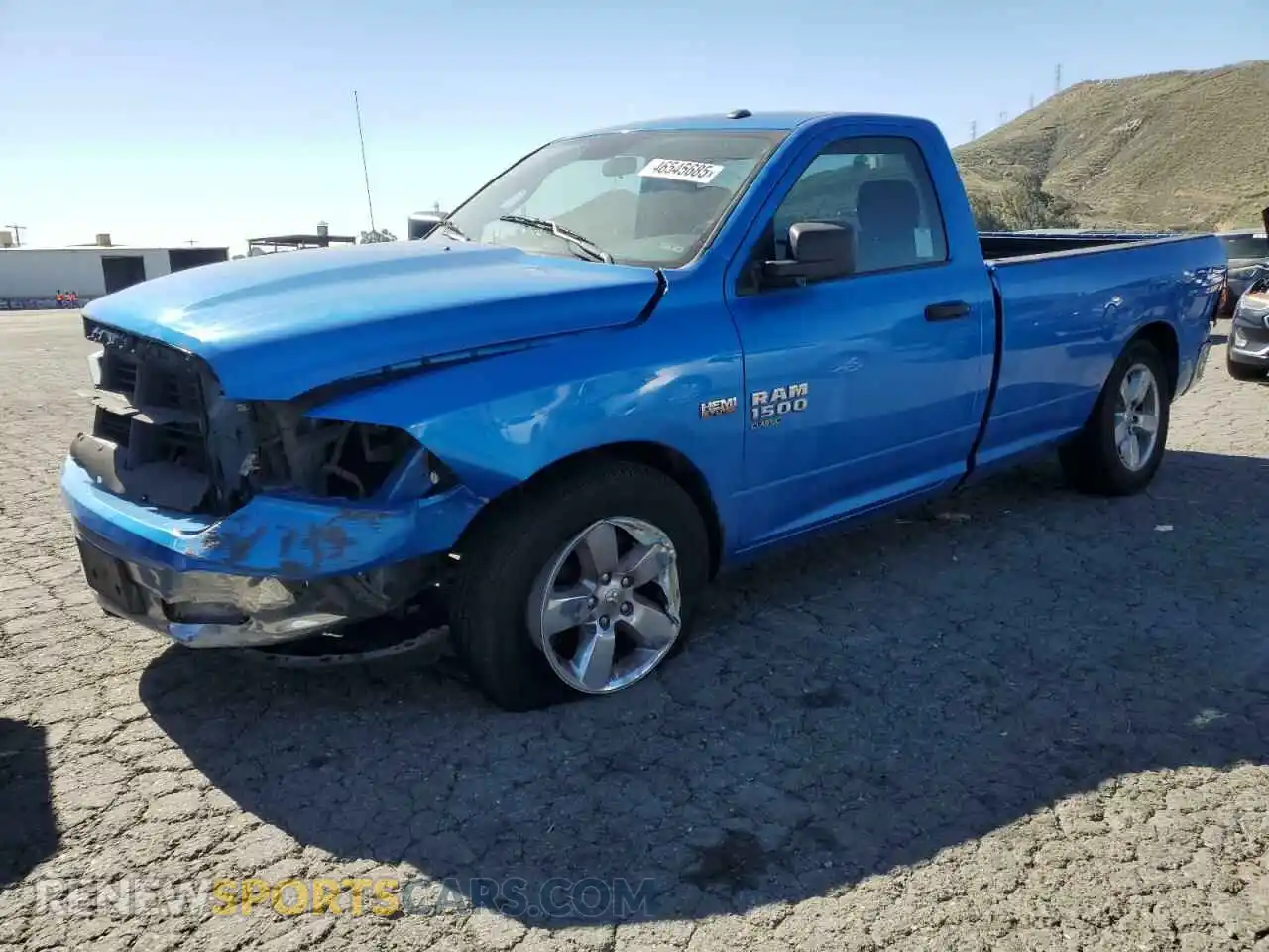 1 Photograph of a damaged car 3C6JR6DT0MG704709 RAM 1500 2021