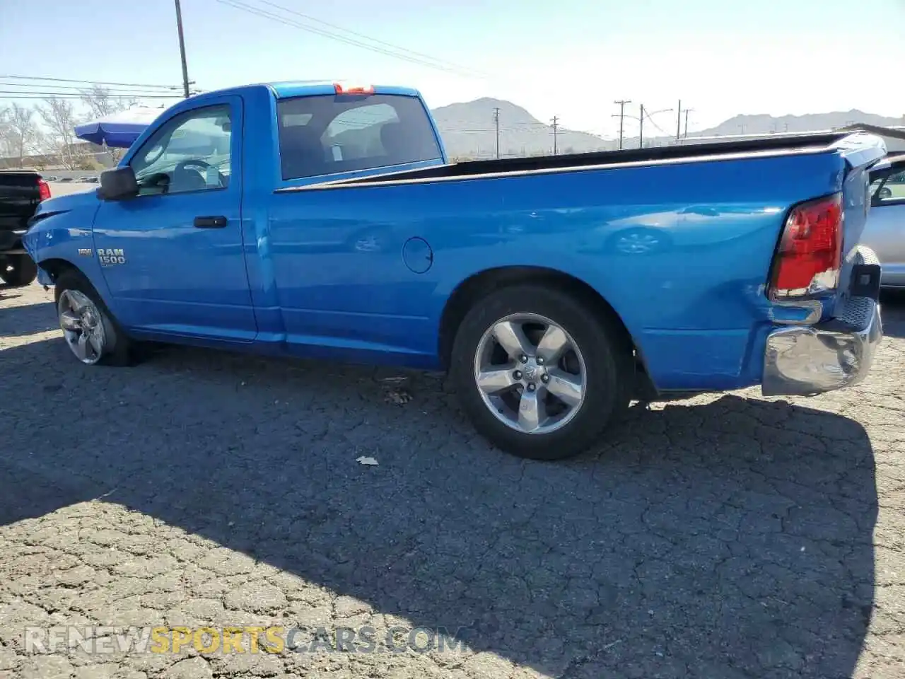 2 Photograph of a damaged car 3C6JR6DT0MG704709 RAM 1500 2021