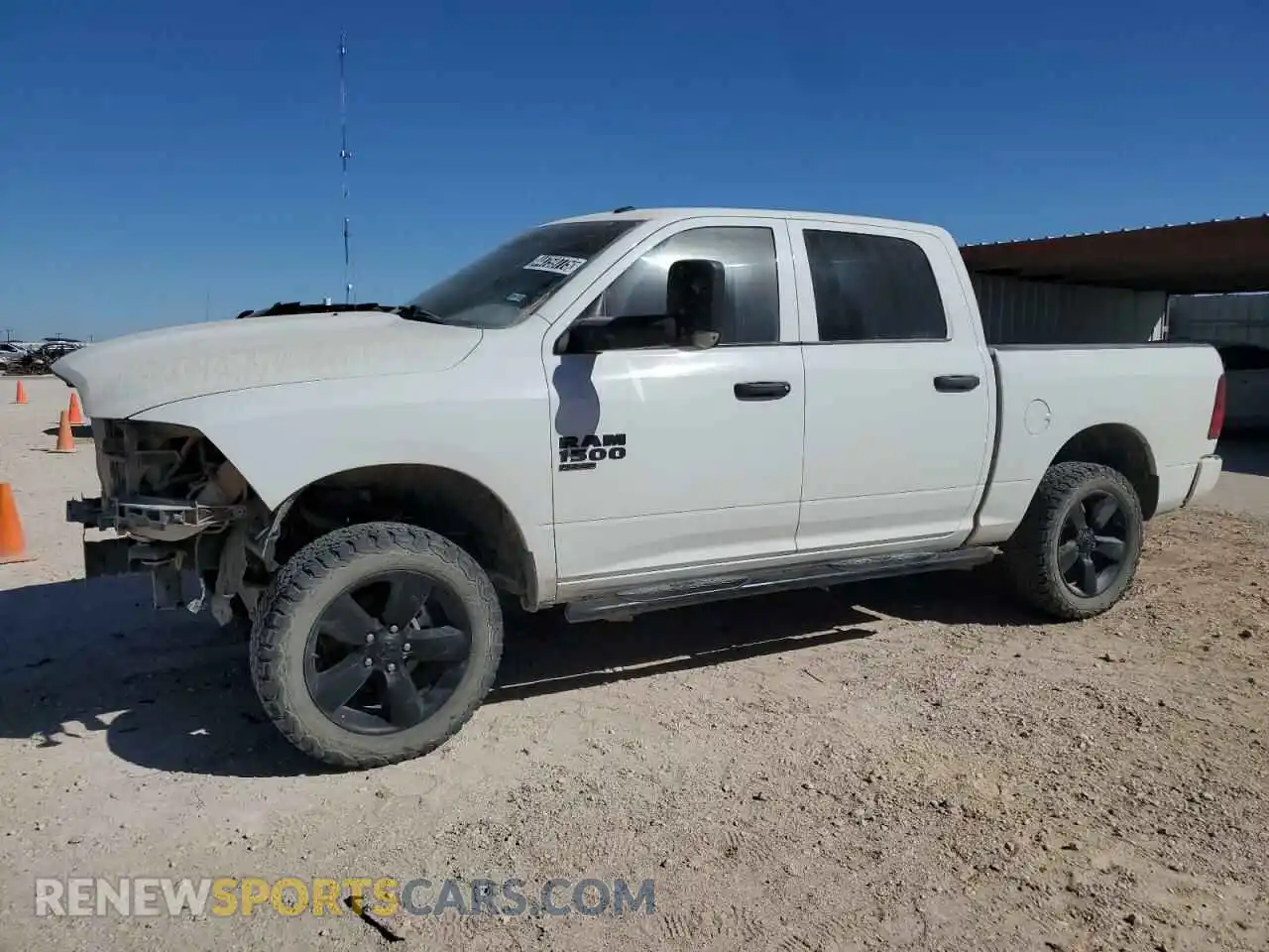 1 Photograph of a damaged car 3C6RR7KG3MG599632 RAM 1500 2021