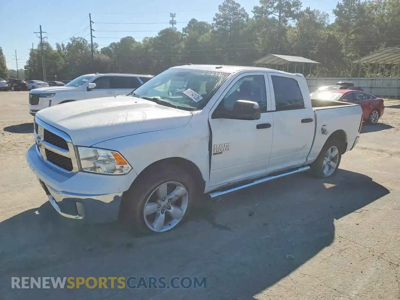 1 Photograph of a damaged car 3C6RR7KG3MG706243 RAM 1500 2021