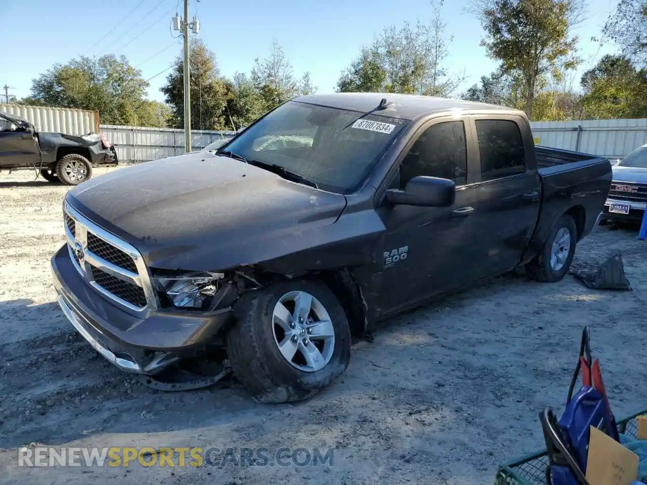 1 Photograph of a damaged car 3C6RR7KG7MG587807 RAM 1500 2021