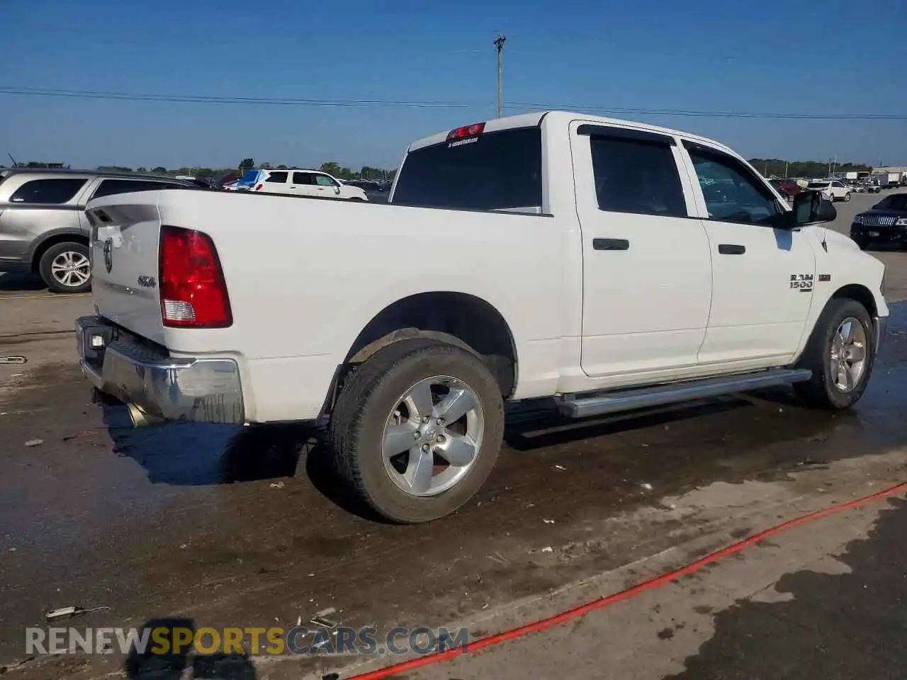3 Photograph of a damaged car 3C6RR7KT0MG665292 RAM 1500 2021