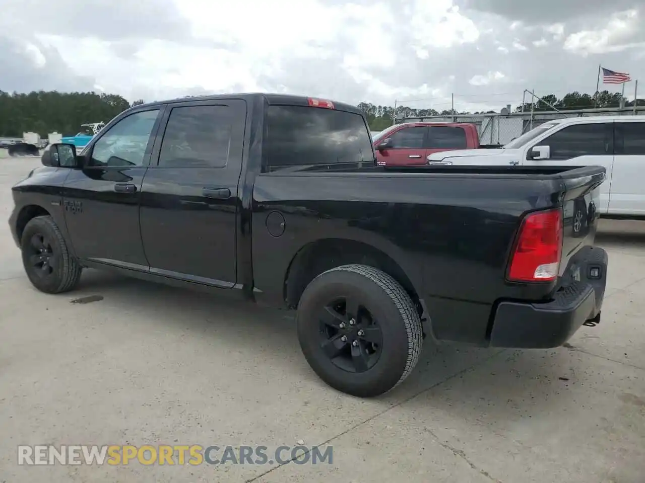 2 Photograph of a damaged car 3C6RR7KT5MG670469 RAM 1500 2021