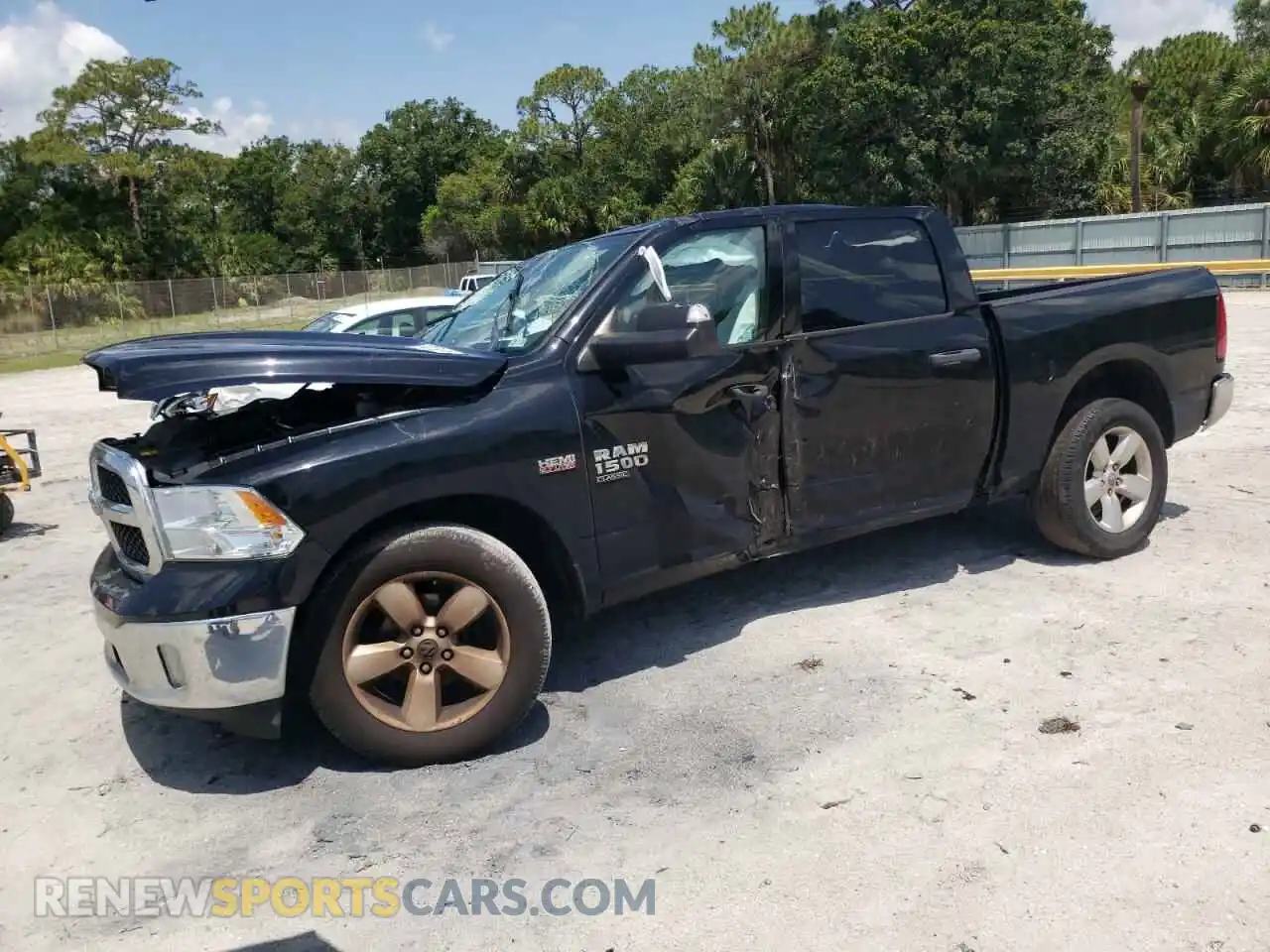 1 Photograph of a damaged car 3C6RR7KT6MG574267 RAM 1500 2021