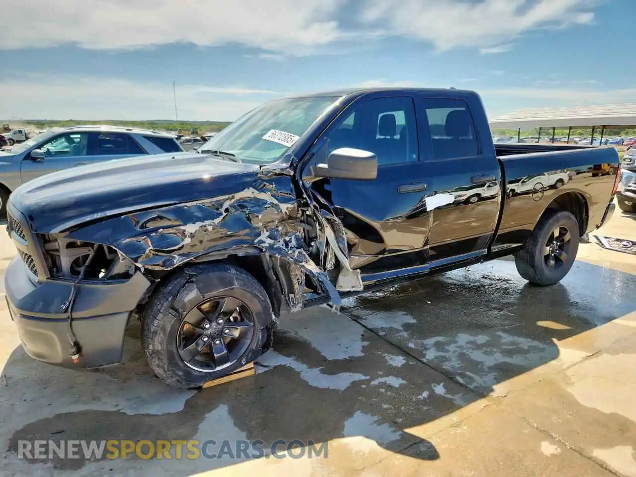 1 Photograph of a damaged car 1C6RR6FG2NS170125 RAM 1500 2022