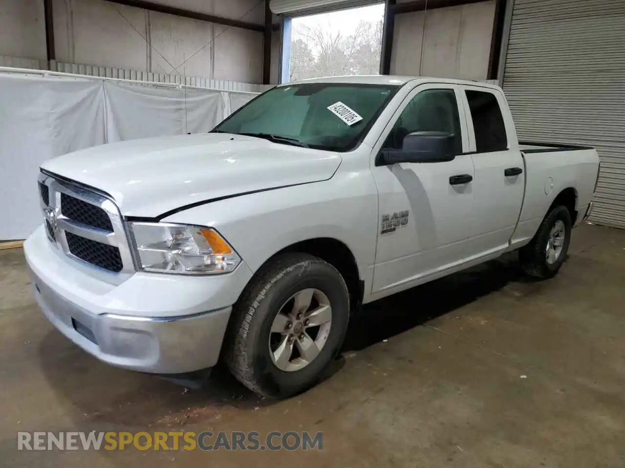 1 Photograph of a damaged car 1C6RR6FG3NS149350 RAM 1500 2022