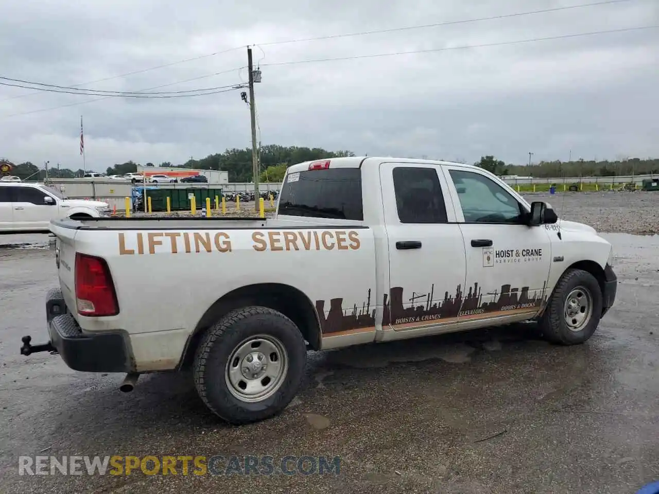 3 Photograph of a damaged car 1C6RR6FT4NS153534 RAM 1500 2022