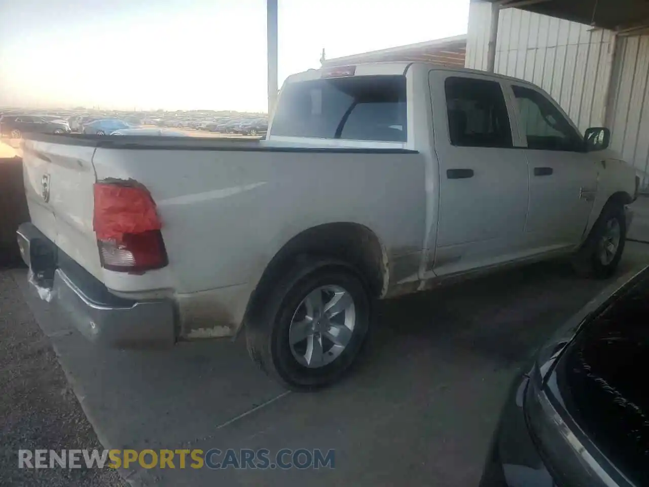 3 Photograph of a damaged car 1C6RR6LG4NS203002 RAM 1500 2022
