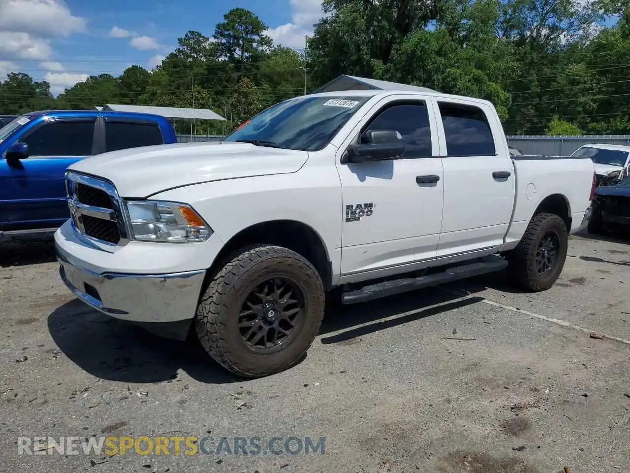 1 Photograph of a damaged car 1C6RR6LG9NS192515 RAM 1500 2022