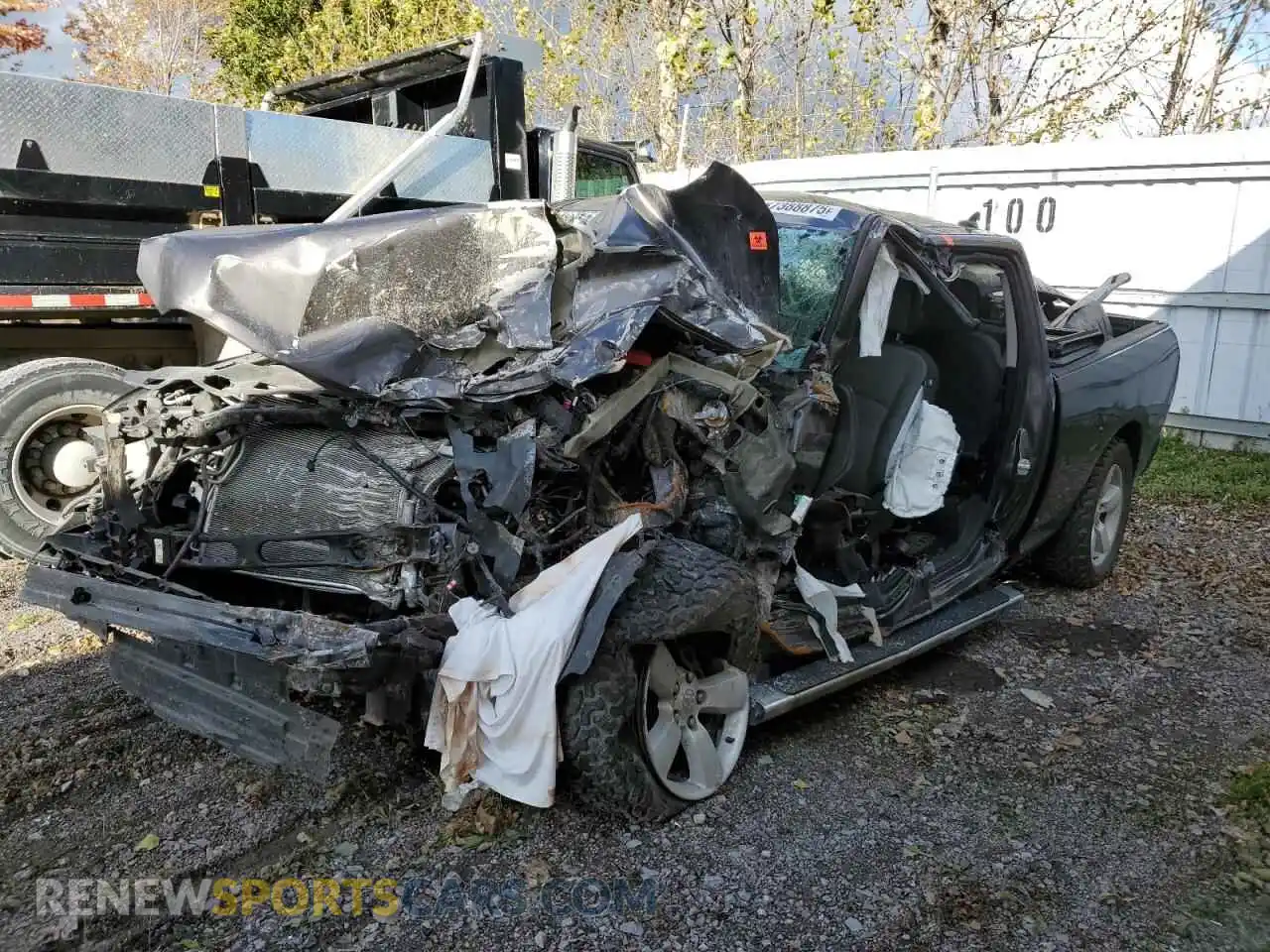 1 Photograph of a damaged car 1C6RR7FG4NS132594 RAM 1500 2022