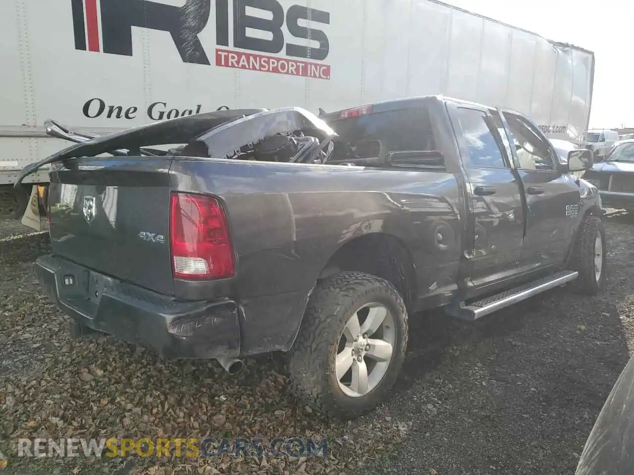 3 Photograph of a damaged car 1C6RR7FG4NS132594 RAM 1500 2022