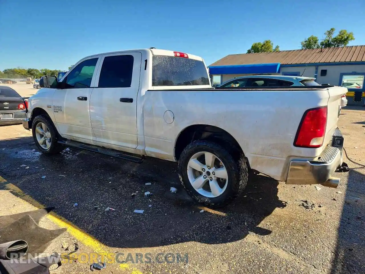 2 fotografías del automóvil dañado 1C6RR7ST3NS202301 RAM 1500 2022