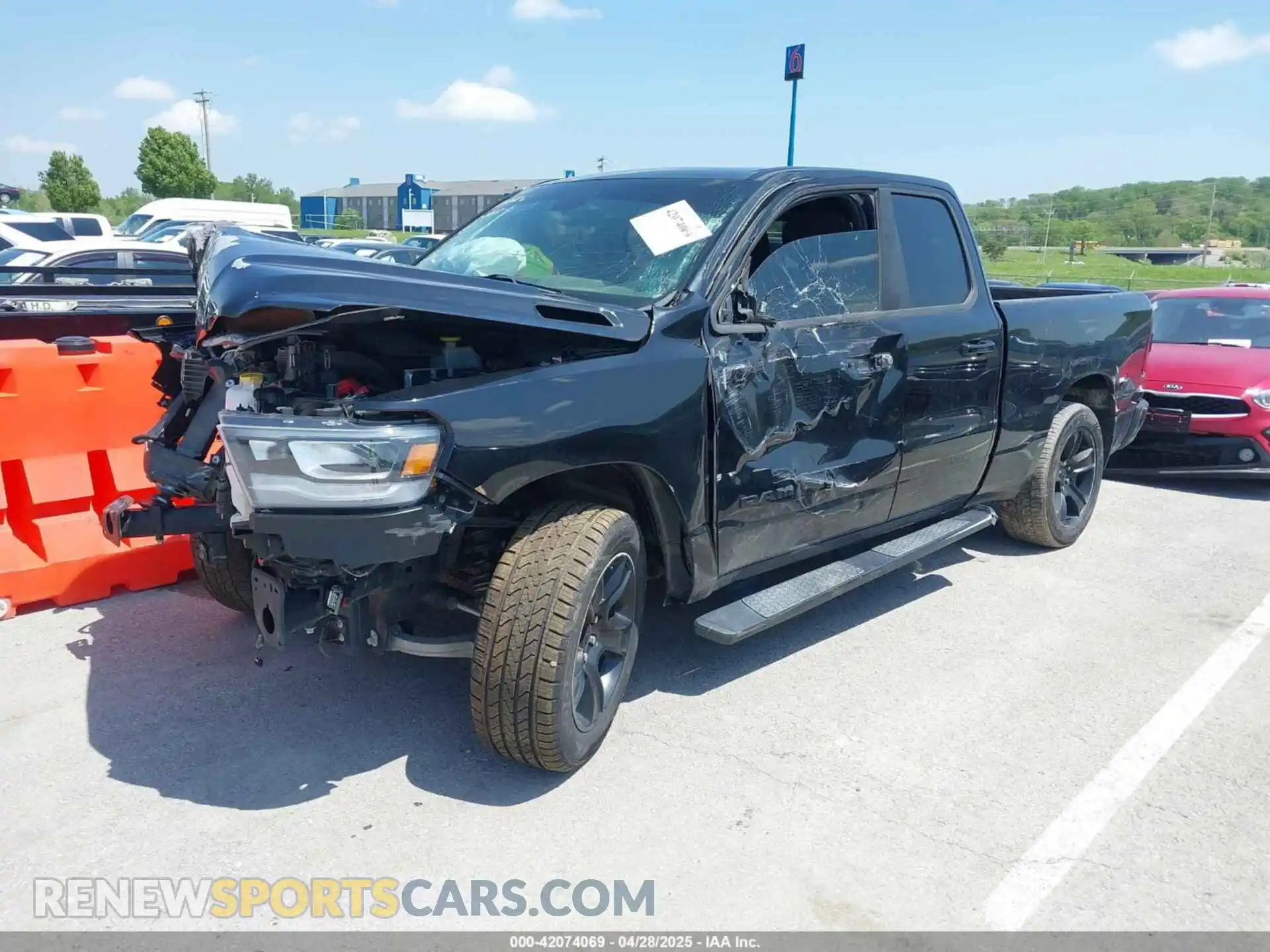 2 Photograph of a damaged car 1C6RREBG2NN122445 RAM 1500 2022