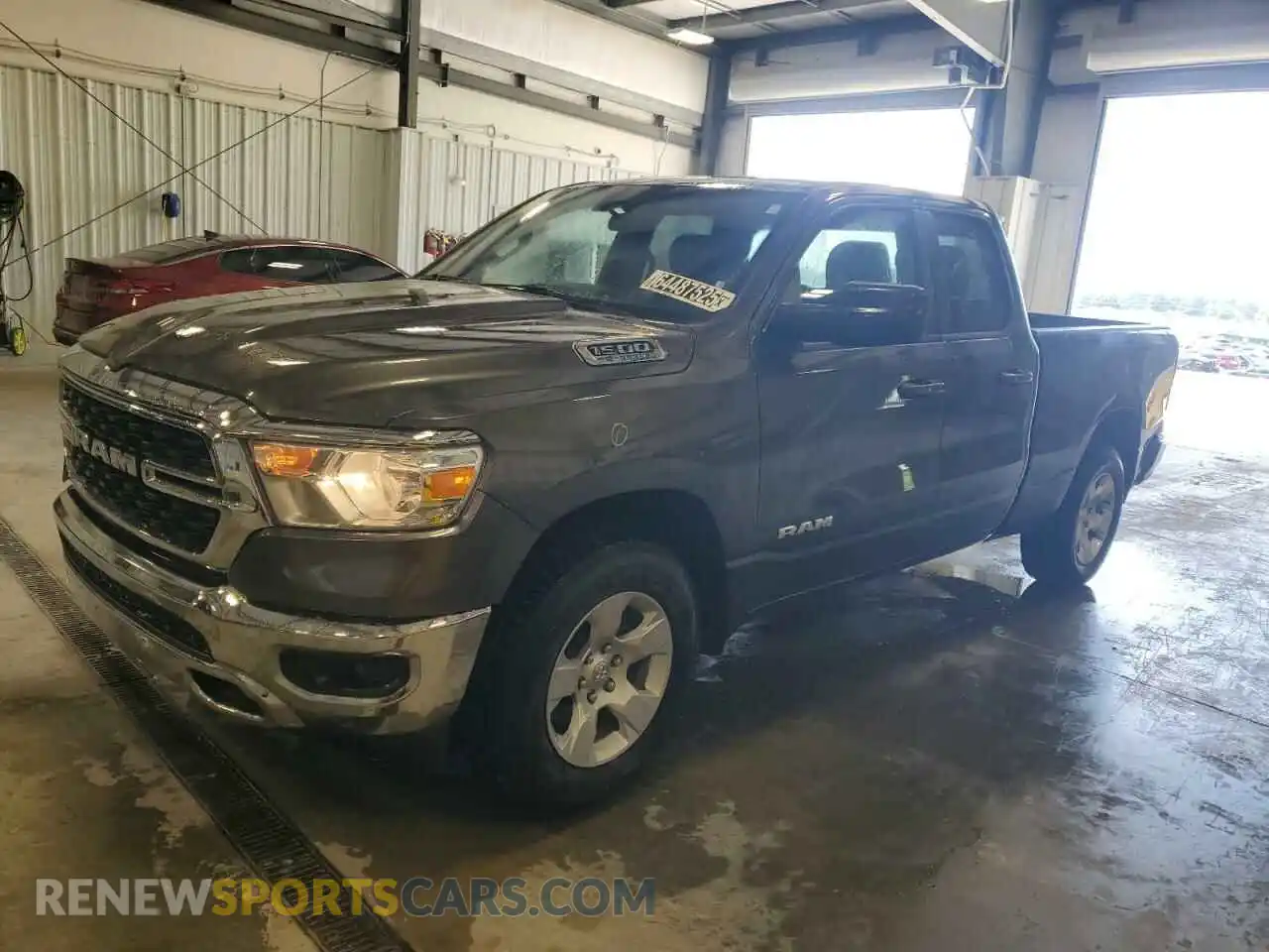 1 Photograph of a damaged car 1C6RREBG4NN273884 RAM 1500 2022