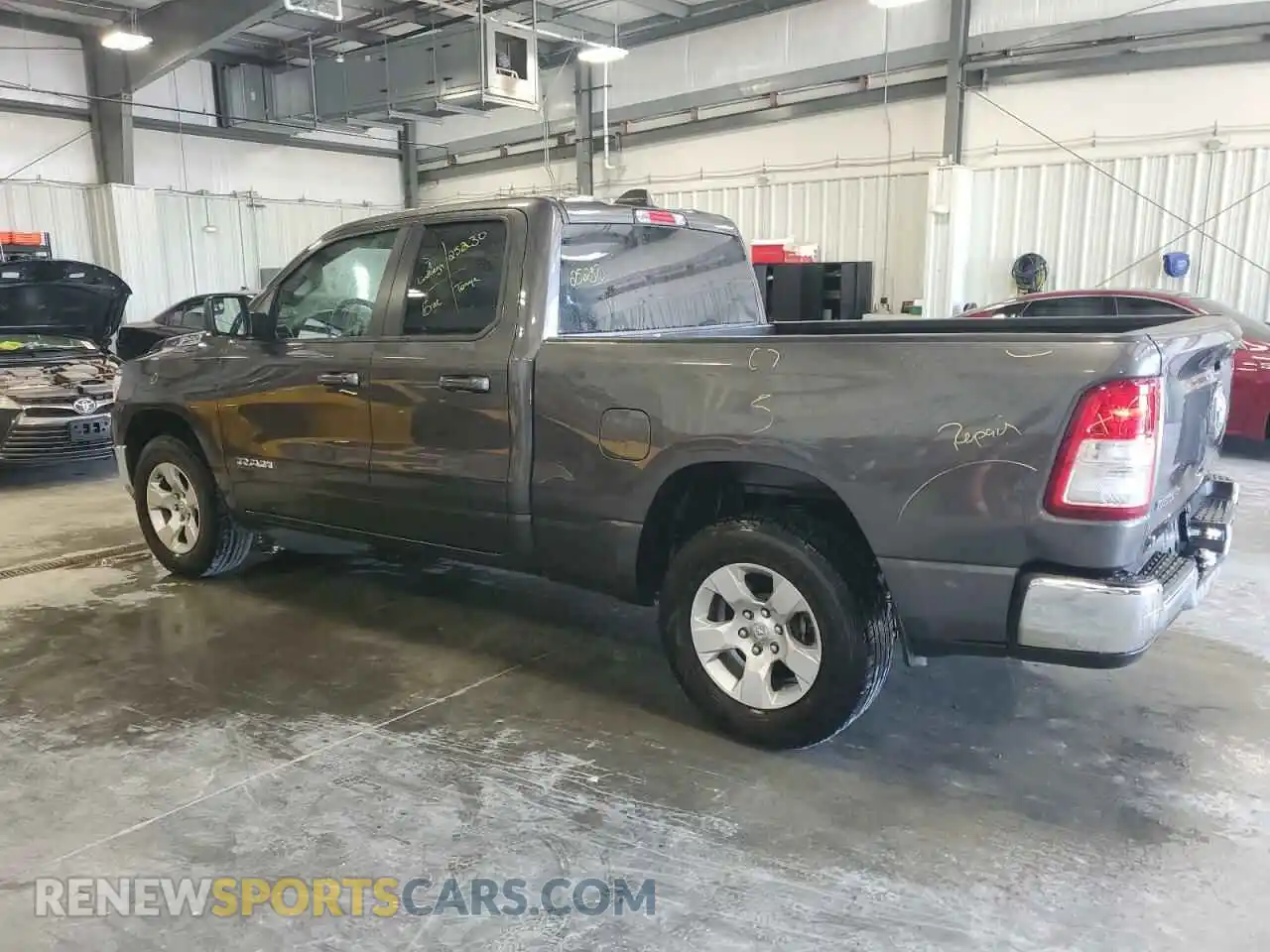 2 Photograph of a damaged car 1C6RREBG4NN273884 RAM 1500 2022