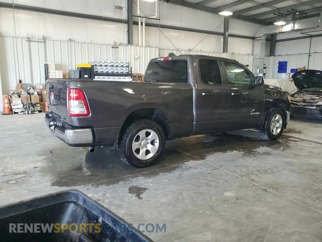 3 Photograph of a damaged car 1C6RREBG4NN273884 RAM 1500 2022