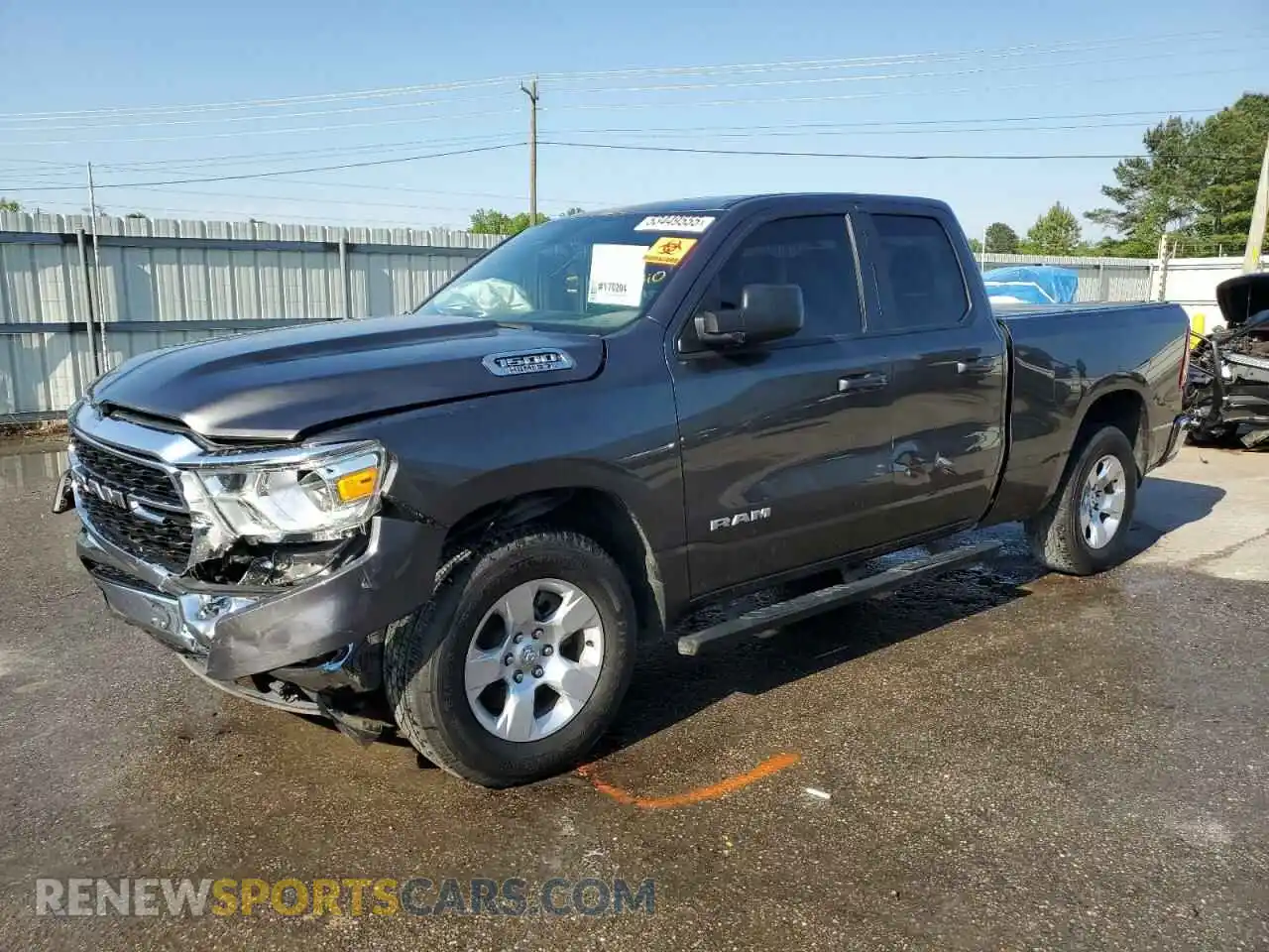 1 Photograph of a damaged car 1C6RREBT0NN231600 RAM 1500 2022