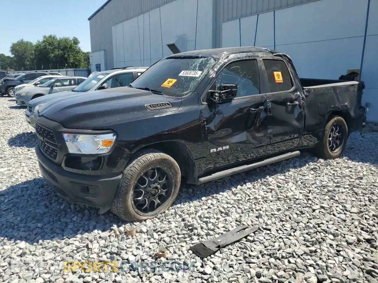 1 Photograph of a damaged car 1C6RREBT1NN201523 RAM 1500 2022