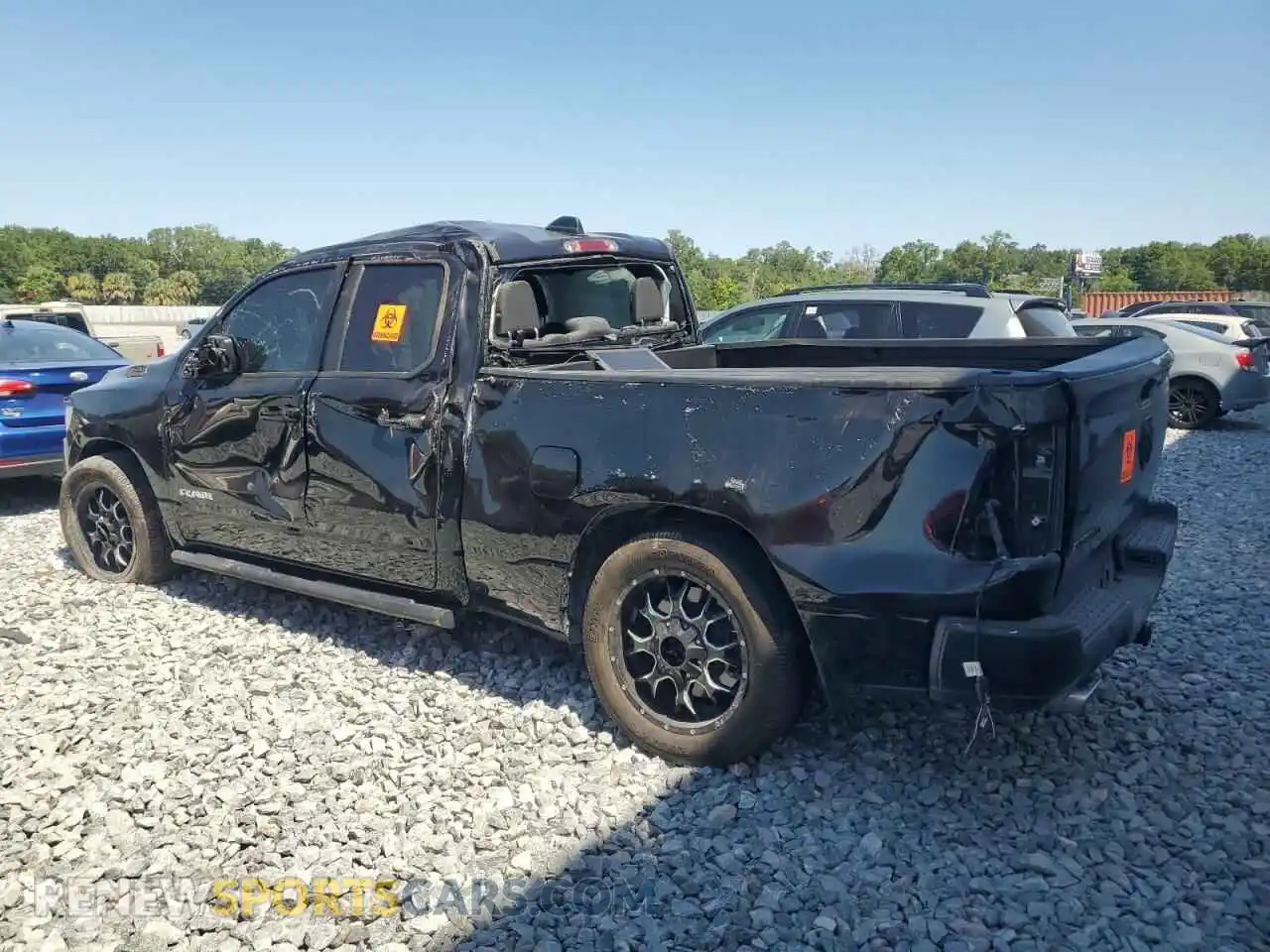 2 Photograph of a damaged car 1C6RREBT1NN201523 RAM 1500 2022