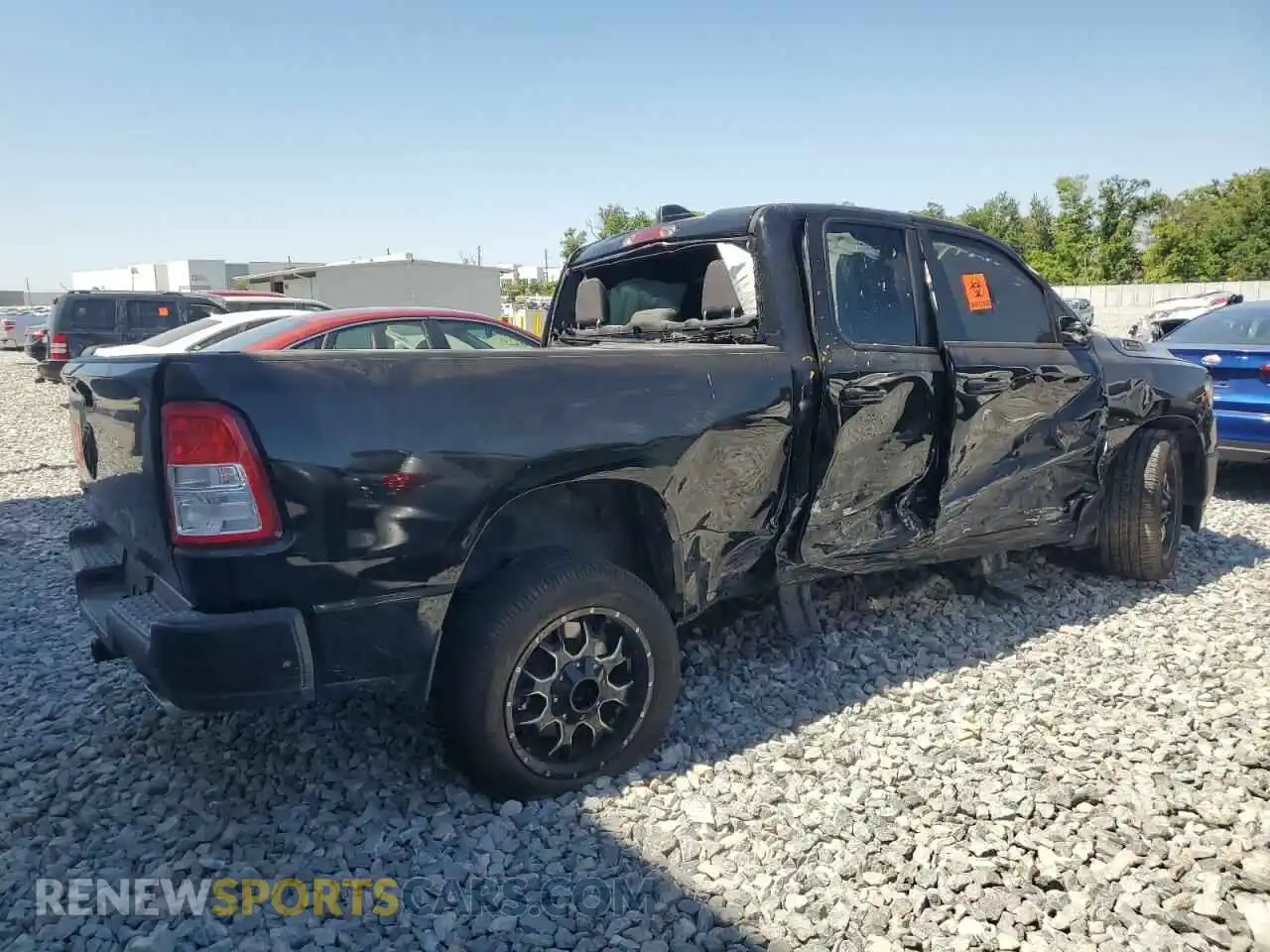 3 Photograph of a damaged car 1C6RREBT1NN201523 RAM 1500 2022