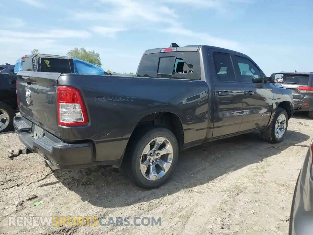 3 Photograph of a damaged car 1C6RREBT5NN201329 RAM 1500 2022