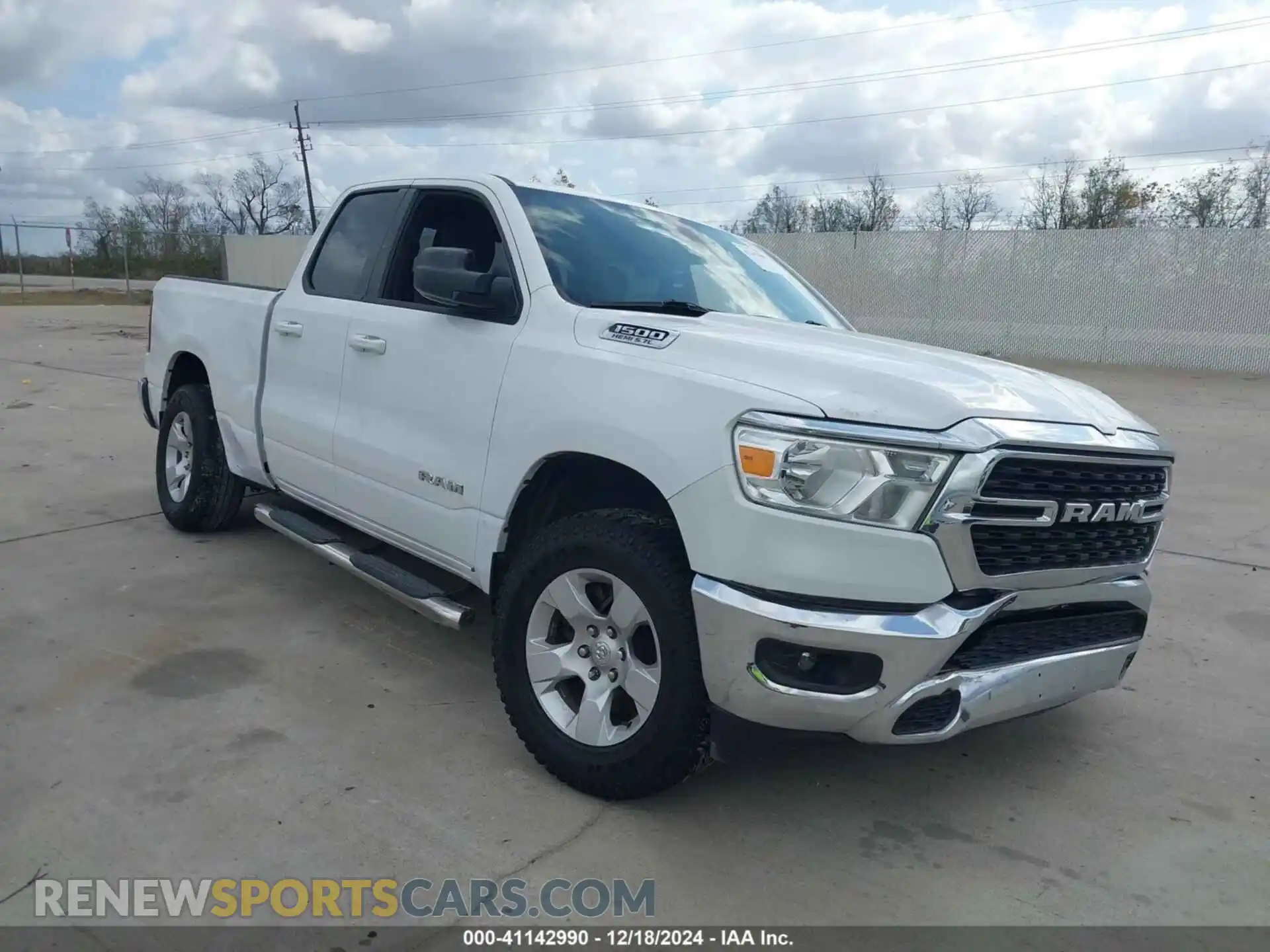 1 Photograph of a damaged car 1C6RREBT7NN228564 RAM 1500 2022