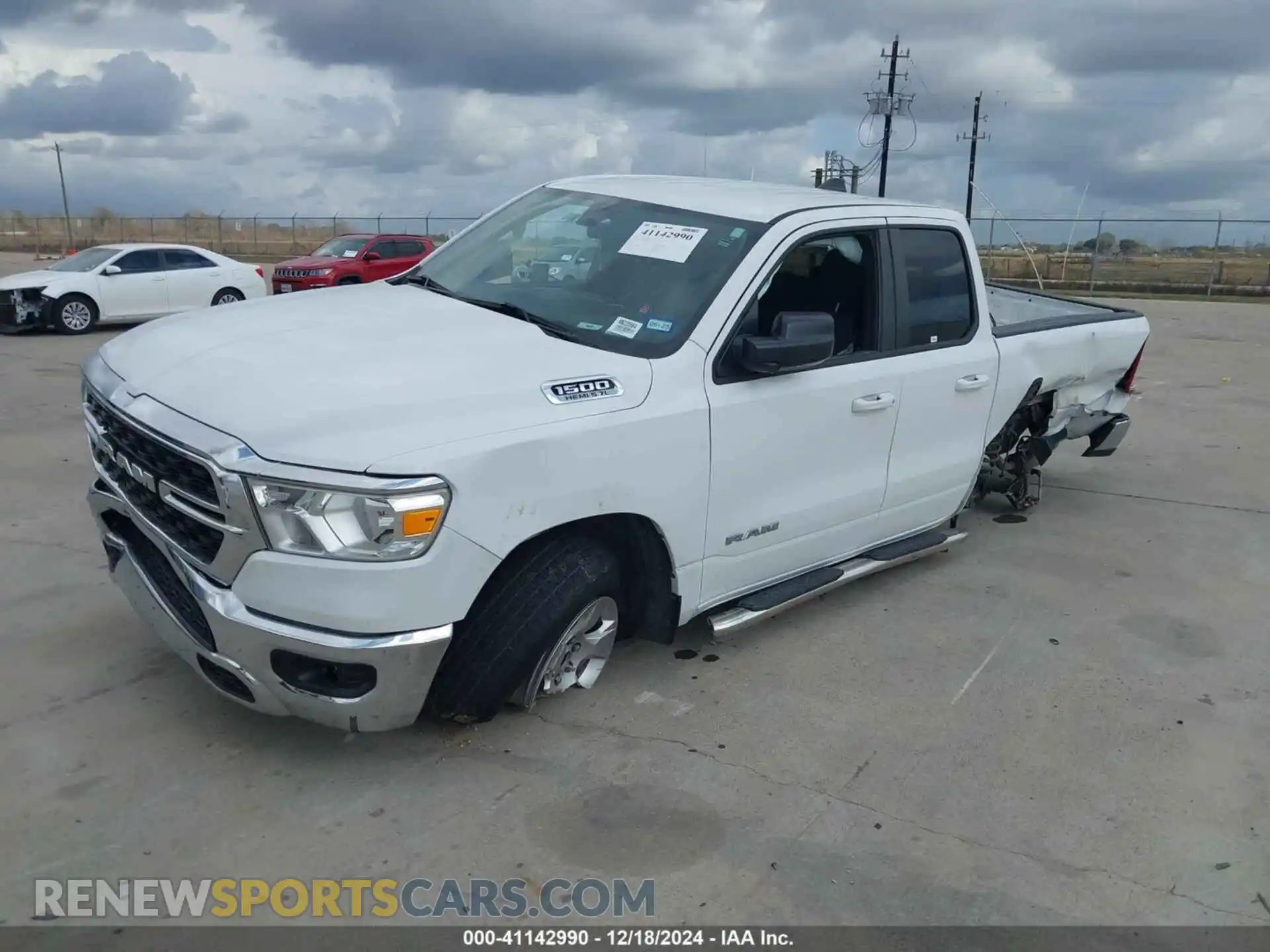 2 Photograph of a damaged car 1C6RREBT7NN228564 RAM 1500 2022